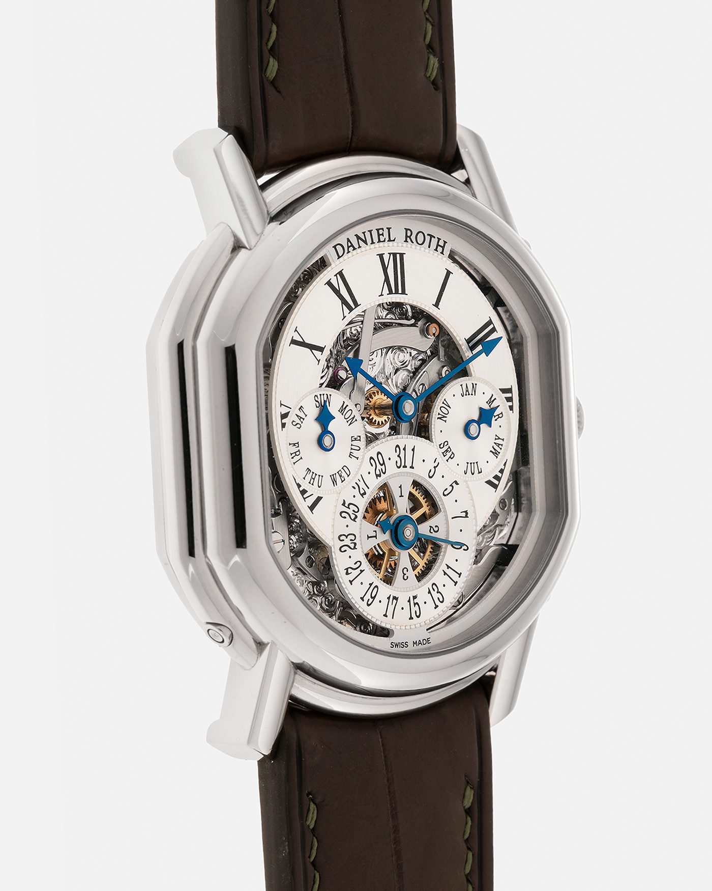 Brand: Daniel Roth Year: 1990’s Model: Perpetual Calendar Skeleton Reference: 119.X.60  Material: 18-carat White Gold Movement: Daniel Roth Cal. DR114 (Based on Girard-Perregaux GP3000), Self-Winding Case Dimensions: 41mm (Including Lugs) x 38mm x 9.8mm Lug Width: 20mm Straps: Custom Dark Brown Alligator Leather Strap with Signed 18-carat White Gold Tang Buckle, with extra Daniel Roth Black Alligator Leather Strap 