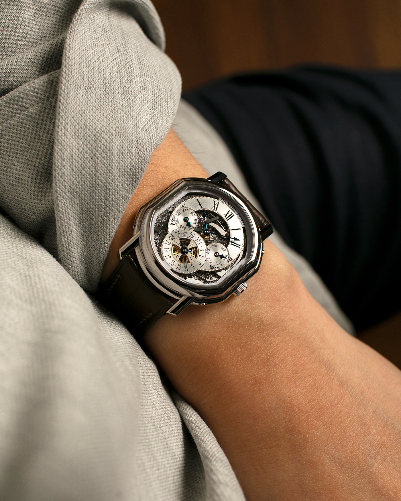 Brand: Daniel Roth
Year: 1990’s
Model: Perpetual Calendar Skeleton
Reference: 119.X.60
Material: 18-carat White Gold
Movement: Daniel Roth Cal. DR114 (Based on Girard-Perregaux GP3000), Self-Winding
Case Dimensions: 41mm (Including Lugs) x 38mm x 9.8mm
Lug Width: 20mm
Straps: Custom Dark Brown Alligator Leather Strap with Signed 18-carat White Gold Tang Buckle, with extra Daniel Roth Black Alligator Leather Strap