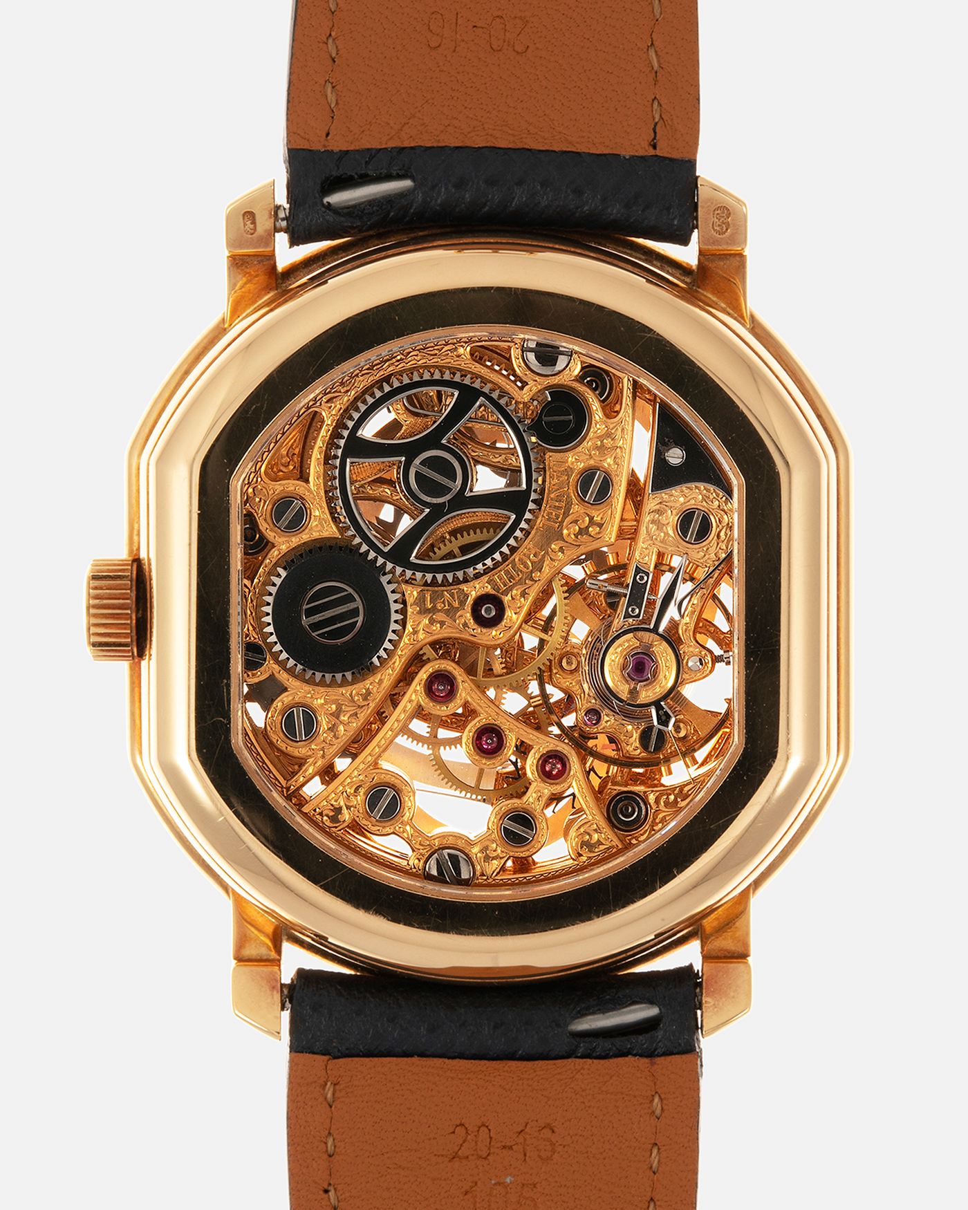 Brand: Daniel Roth
Year: 1990’s
Model: 2127 Retrograde Skeleton
Material: 18-carat Yellow Gold
Movement: Lemania Cal. 27LN with Retrograde Function, Manual-Winding
Case Diameter: 35mm x 38mm (41mm Lug-to-Lug)
Lug Width: 20mm
Strap: Molequin Navy Blue Grained Calf Strap with Signed 18-carat Yellow Gold Tang Buckle