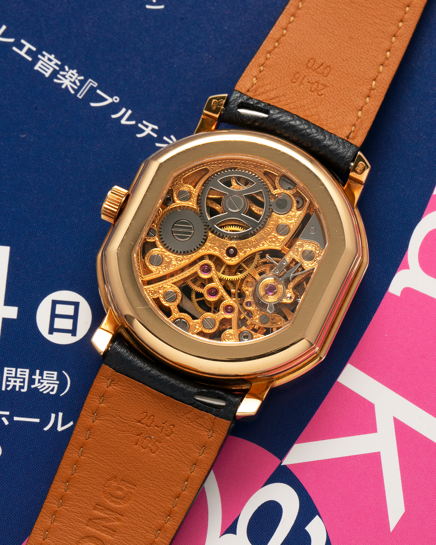 Brand: Daniel Roth
Year: 1990’s
Model: 2127 Retrograde Skeleton
Material: 18-carat Yellow Gold
Movement: Lemania Cal. 27LN with Retrograde Function, Manual-Winding
Case Diameter: 35mm x 38mm (41mm Lug-to-Lug)
Lug Width: 20mm
Strap: Molequin Navy Blue Grained Calf Strap with Signed 18-carat Yellow Gold Tang Buckle