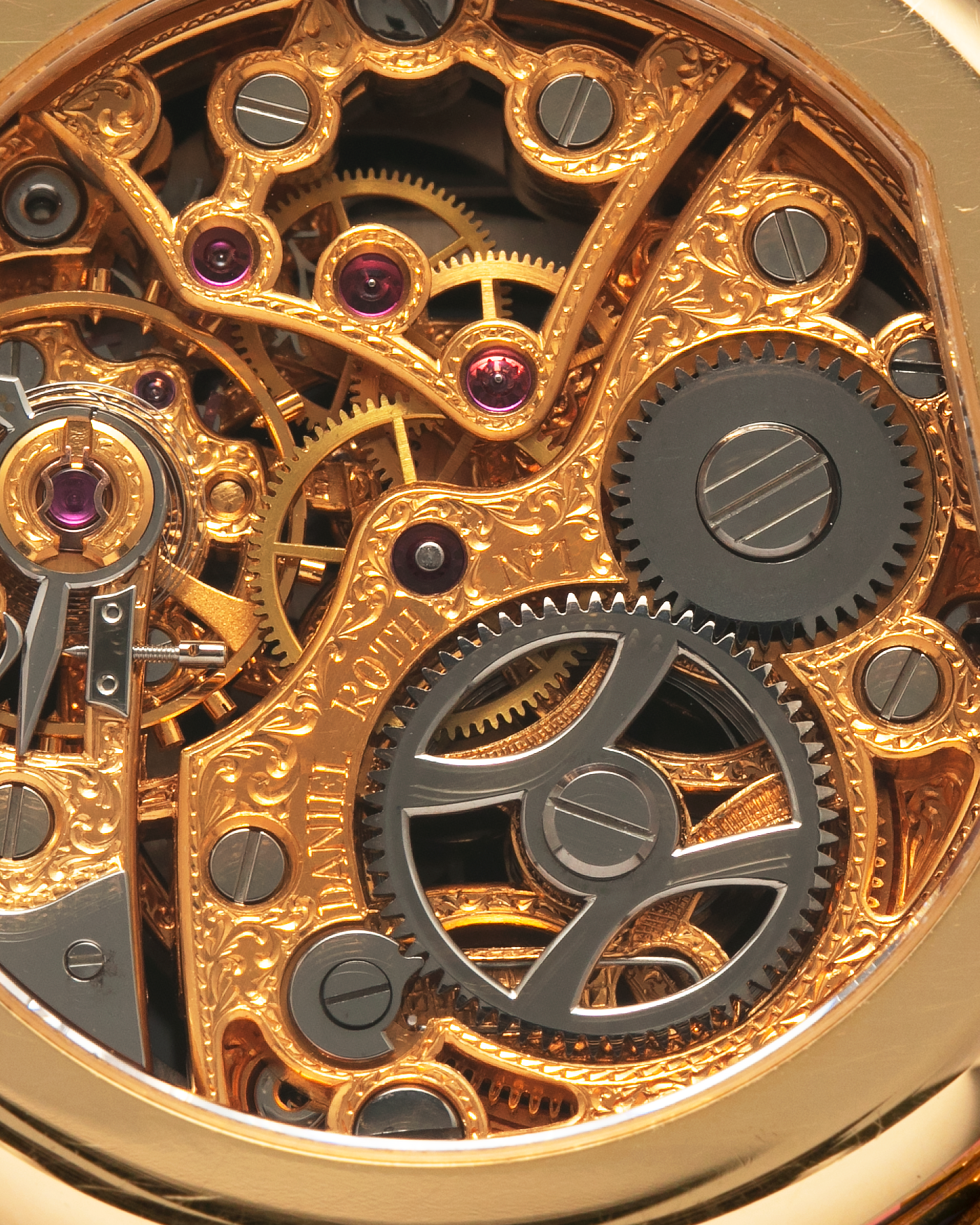 Brand: Daniel Roth
Year: 1990’s
Model: 2127 Retrograde Skeleton
Material: 18-carat Yellow Gold
Movement: Lemania Cal. 27LN with Retrograde Function, Manual-Winding
Case Diameter: 35mm x 38mm (41mm Lug-to-Lug)
Lug Width: 20mm
Strap: Molequin Navy Blue Grained Calf Strap with Signed 18-carat Yellow Gold Tang Buckle