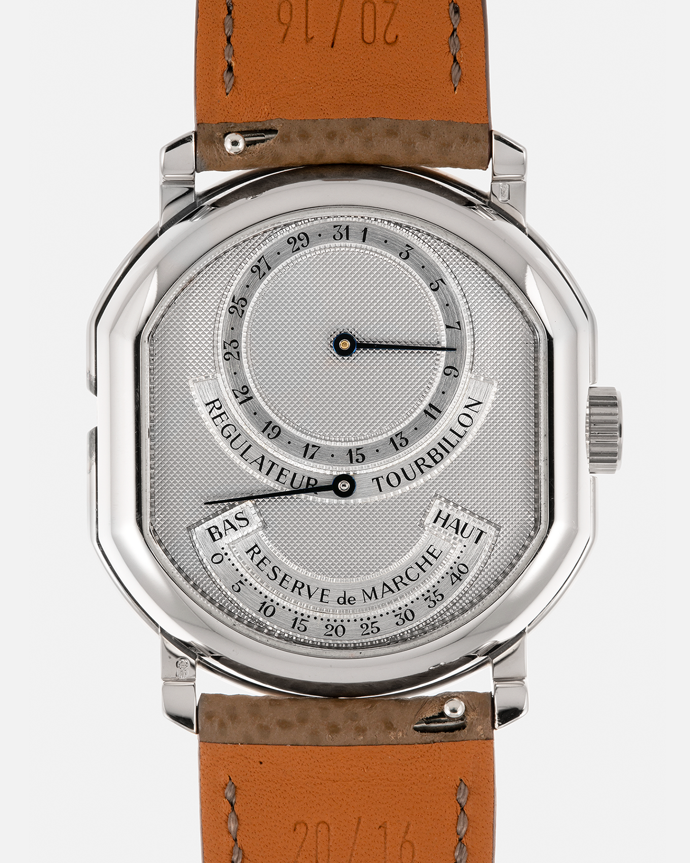 Brand: Daniel Roth
Year: Early 1990’s
Model: 2187 Régulateur Tourbillon Clou De Paris Guilloché (First Generation)
Material: 18-carat White Gold
Movement: Daniel Roth Cal. DR 307 One-Minute Tourbillon (Based on Lemania Cal. 387 Ébauche), Manual-Winding
Case Dimensions: 35mm x 38mm (Lug-to-Lug 41mm)
Lug Width: 20mm
Strap: Nostime Taupe Brown Textured Calf Leather Strap