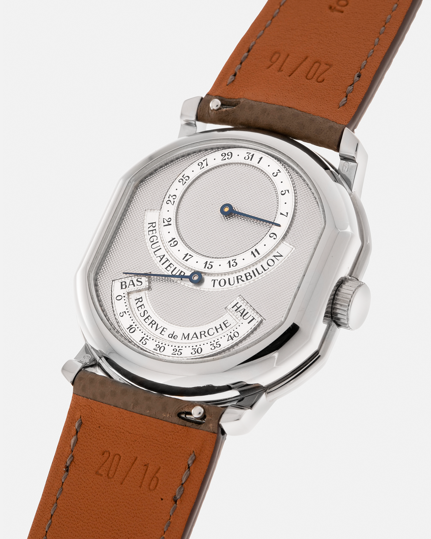 Brand: Daniel Roth
Year: Early 1990’s
Model: 2187 Régulateur Tourbillon Clou De Paris Guilloché (First Generation)
Material: 18-carat White Gold
Movement: Daniel Roth Cal. DR 307 One-Minute Tourbillon (Based on Lemania Cal. 387 Ébauche), Manual-Winding
Case Dimensions: 35mm x 38mm (Lug-to-Lug 41mm)
Lug Width: 20mm
Strap: Nostime Taupe Brown Textured Calf Leather Strap