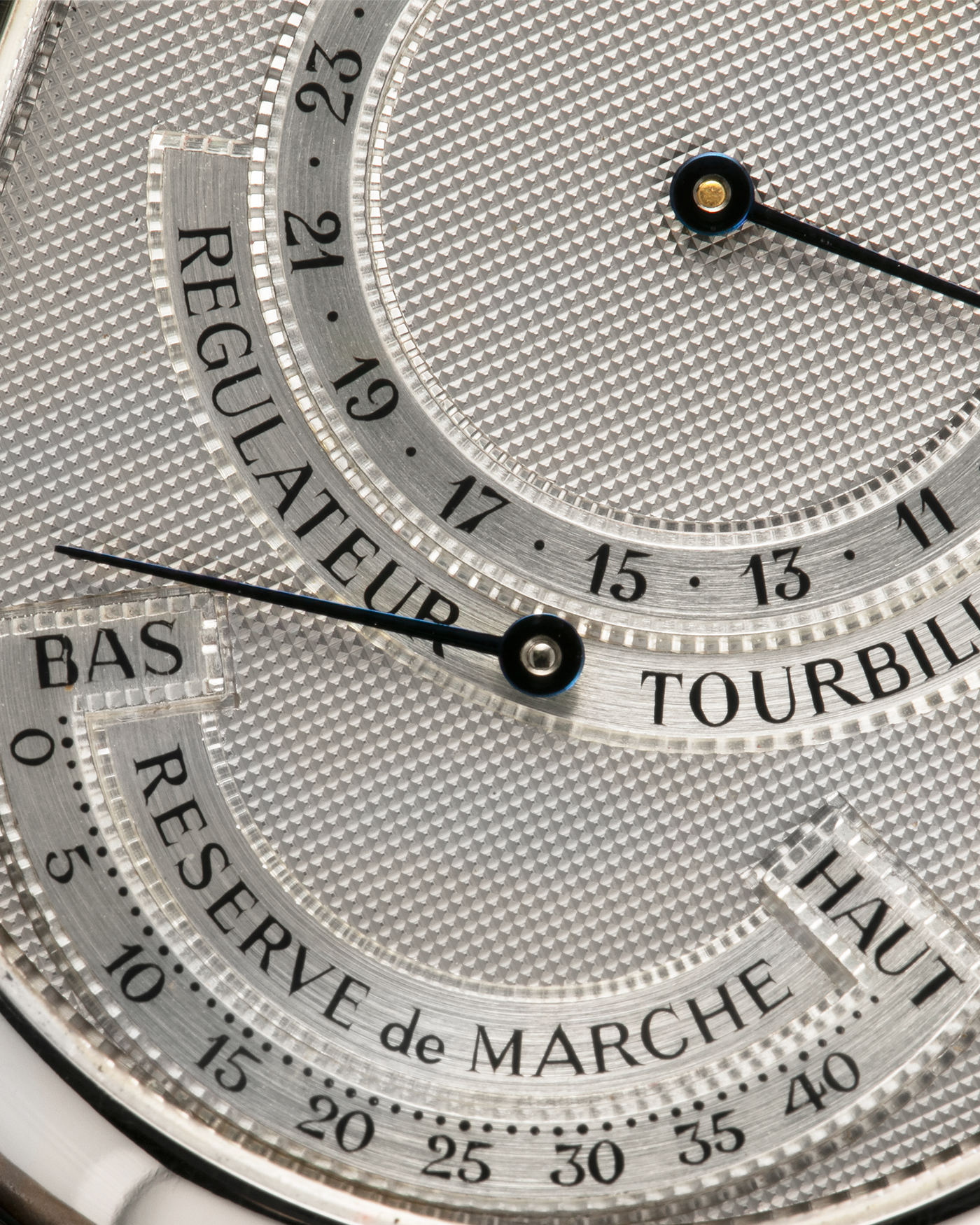 Brand: Daniel Roth
Year: Early 1990’s
Model: 2187 Régulateur Tourbillon Clou De Paris Guilloché (First Generation)
Material: 18-carat White Gold
Movement: Daniel Roth Cal. DR 307 One-Minute Tourbillon (Based on Lemania Cal. 387 Ébauche), Manual-Winding
Case Dimensions: 35mm x 38mm (Lug-to-Lug 41mm)
Lug Width: 20mm
Strap: Nostime Taupe Brown Textured Calf Leather Strap