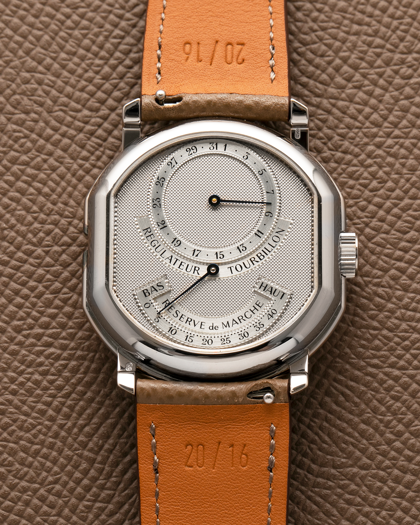 Brand: Daniel Roth
Year: Early 1990’s
Model: 2187 Régulateur Tourbillon Clou De Paris Guilloché (First Generation)
Material: 18-carat White Gold
Movement: Daniel Roth Cal. DR 307 One-Minute Tourbillon (Based on Lemania Cal. 387 Ébauche), Manual-Winding
Case Dimensions: 35mm x 38mm (Lug-to-Lug 41mm)
Lug Width: 20mm
Strap: Nostime Taupe Brown Textured Calf Leather Strap