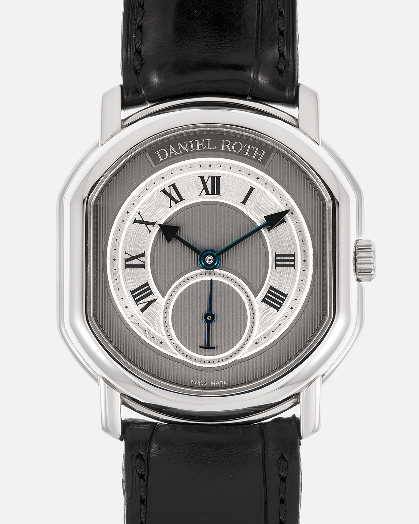 Brand: Daniel Roth
Year: 1990’s
Model: Seconds at Six
Reference: 207
Material: Stainless Steel
Movement: Daniel Roth Cal. DR111 (Girard-Perregaux based), Self-Winding
Case Dimensions: 35mm x 38mm (Lug-to-Lug 41mm)
Lug Width: 20mm
Strap: Daniel Roth Black Alligator Leather Strap with Signed Stainless Steel Deployant Clasp