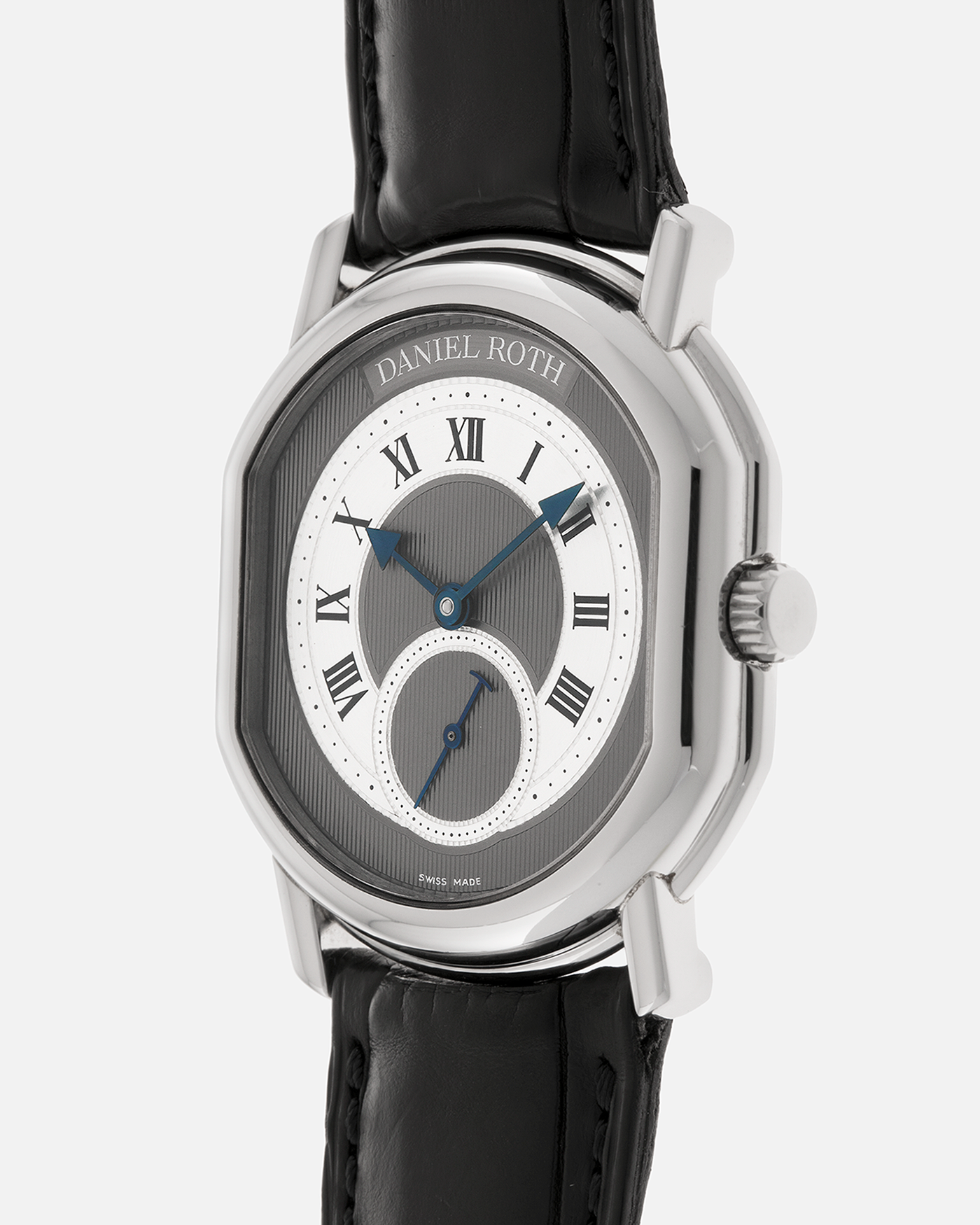 Brand: Daniel Roth
Year: 1990’s
Model: Seconds at Six
Reference: 207
Material: Stainless Steel
Movement: Daniel Roth Cal. DR111 (Girard-Perregaux based), Self-Winding
Case Dimensions: 35mm x 38mm (Lug-to-Lug 41mm)
Lug Width: 20mm
Strap: Daniel Roth Black Alligator Leather Strap with Signed Stainless Steel Deployant Clasp