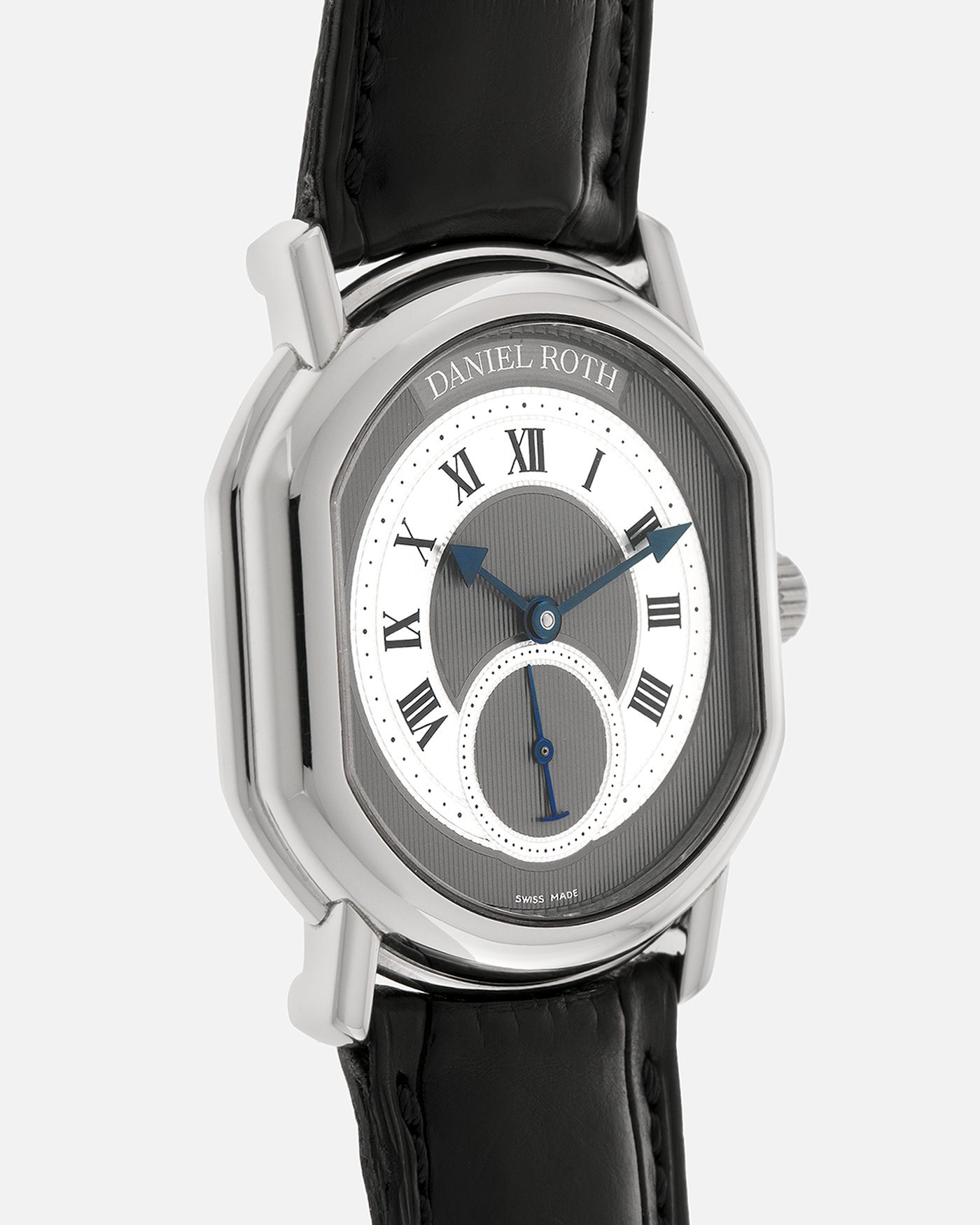 Brand: Daniel Roth
Year: 1990’s
Model: Seconds at Six
Reference: 207
Material: Stainless Steel
Movement: Daniel Roth Cal. DR111 (Girard-Perregaux based), Self-Winding
Case Dimensions: 35mm x 38mm (Lug-to-Lug 41mm)
Lug Width: 20mm
Strap: Daniel Roth Black Alligator Leather Strap with Signed Stainless Steel Deployant Clasp