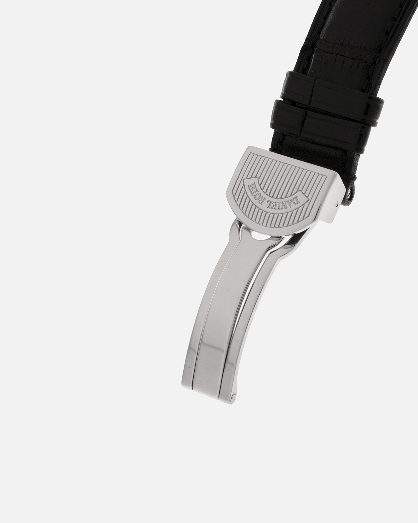 Brand: Daniel Roth
Year: 1990’s
Model: Seconds at Six
Reference: 207
Material: Stainless Steel
Movement: Daniel Roth Cal. DR111 (Girard-Perregaux based), Self-Winding
Case Dimensions: 35mm x 38mm (Lug-to-Lug 41mm)
Lug Width: 20mm
Strap: Daniel Roth Black Alligator Leather Strap with Signed Stainless Steel Deployant Clasp