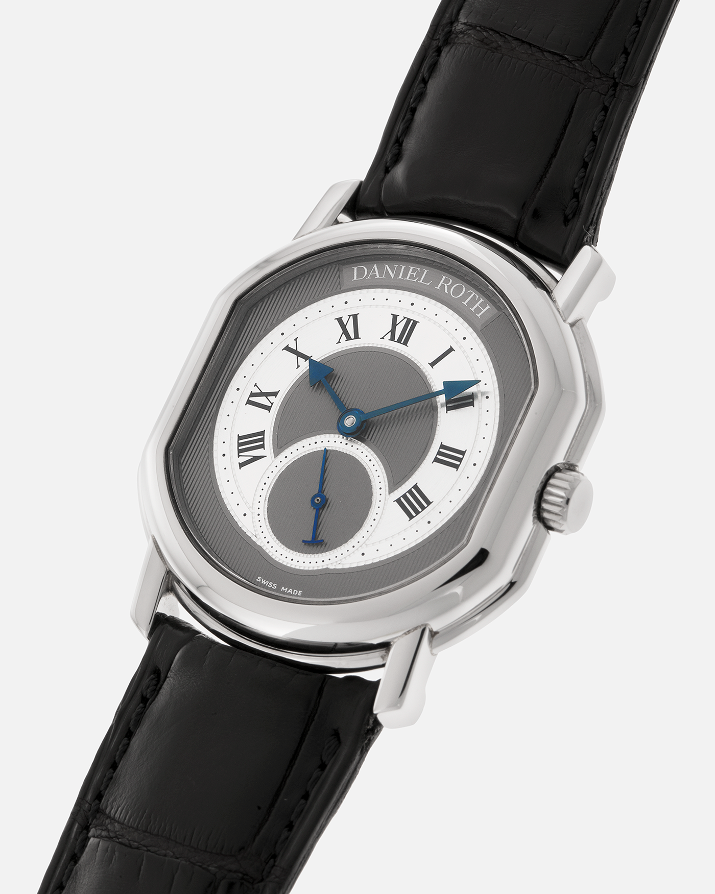 Brand: Daniel Roth
Year: 1990’s
Model: Seconds at Six
Reference: 207
Material: Stainless Steel
Movement: Daniel Roth Cal. DR111 (Girard-Perregaux based), Self-Winding
Case Dimensions: 35mm x 38mm (Lug-to-Lug 41mm)
Lug Width: 20mm
Strap: Daniel Roth Black Alligator Leather Strap with Signed Stainless Steel Deployant Clasp