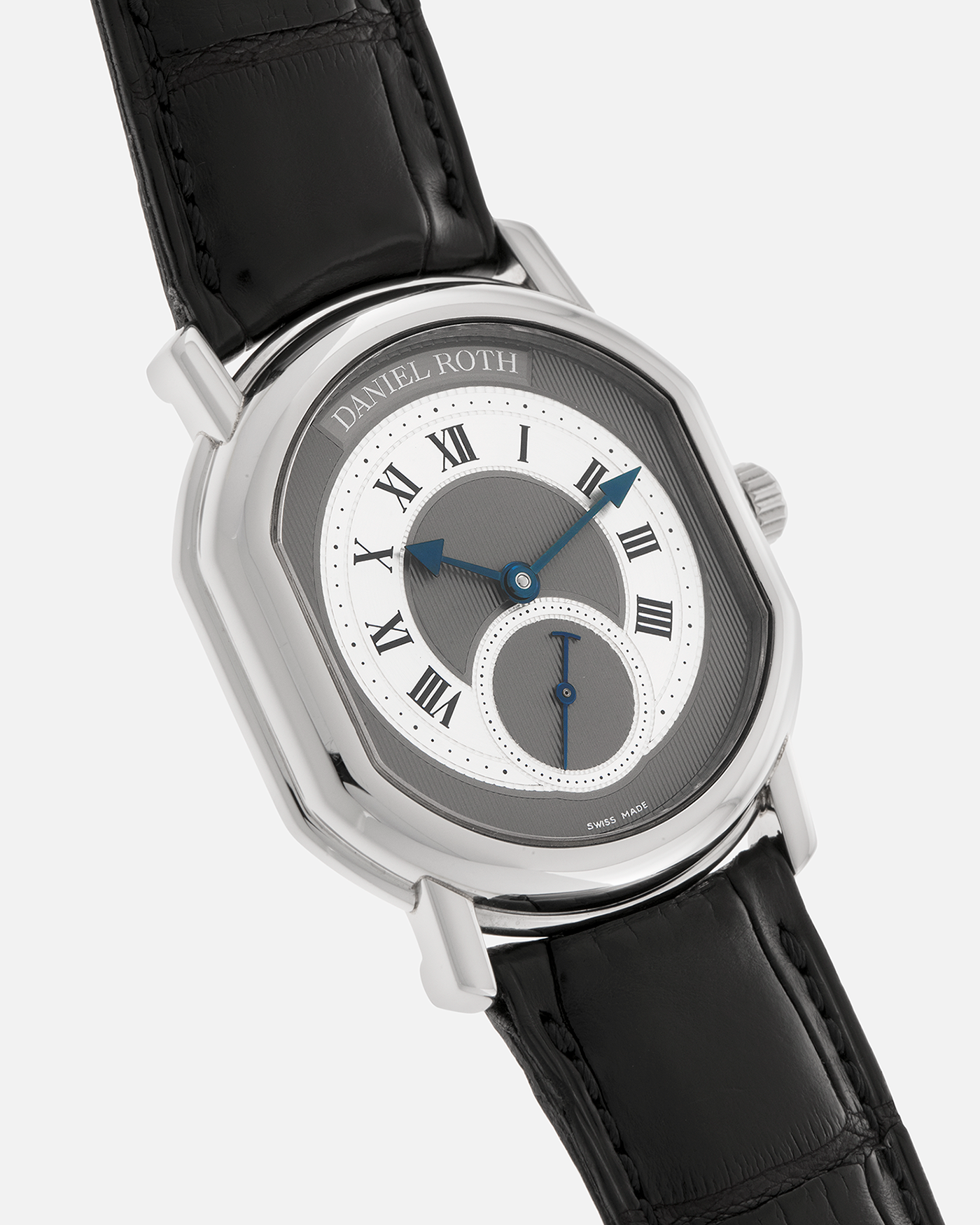 Brand: Daniel Roth
Year: 1990’s
Model: Seconds at Six
Reference: 207
Material: Stainless Steel
Movement: Daniel Roth Cal. DR111 (Girard-Perregaux based), Self-Winding
Case Dimensions: 35mm x 38mm (Lug-to-Lug 41mm)
Lug Width: 20mm
Strap: Daniel Roth Black Alligator Leather Strap with Signed Stainless Steel Deployant Clasp