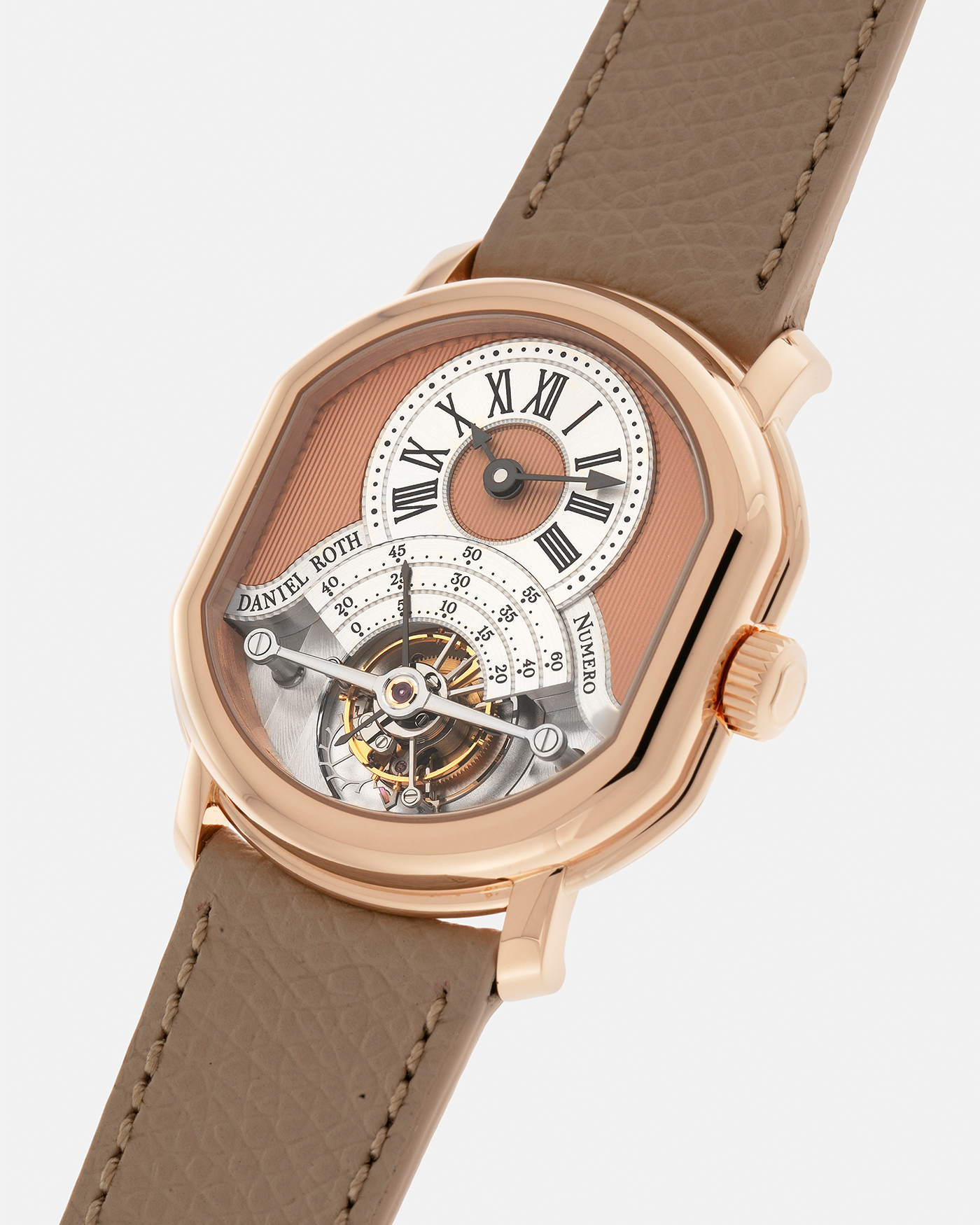 Brand: Daniel Roth
Year: 2025
Model: Tourbillon Rose Gold
Material: 18-carat Rose Gold, 925 Sterling Silver
Movement: Daniel Roth Cal. DR001, Manual-Winding
Case Dimensions: 35.5mm x 38.6mm x 9.2mm (Lug-to-Lug 42mm)
Lug Width: 20mm
Strap: Daniel Roth Taupe Calfskin Leather Strap with Signed 18-carat Rose Gold Tang Buckle