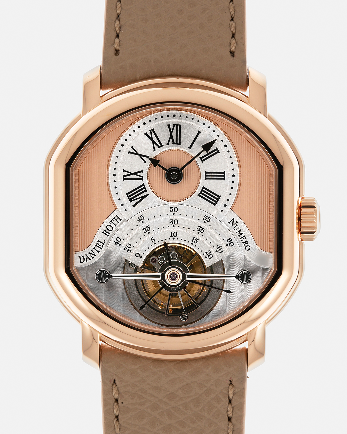Brand: Daniel Roth
Year: 2025
Model: Tourbillon Rose Gold
Material: 18-carat Rose Gold, 925 Sterling Silver
Movement: Daniel Roth Cal. DR001, Manual-Winding
Case Dimensions: 35.5mm x 38.6mm x 9.2mm (Lug-to-Lug 42mm)
Lug Width: 20mm
Strap: Daniel Roth Taupe Calfskin Leather Strap with Signed 18-carat Rose Gold Tang Buckle