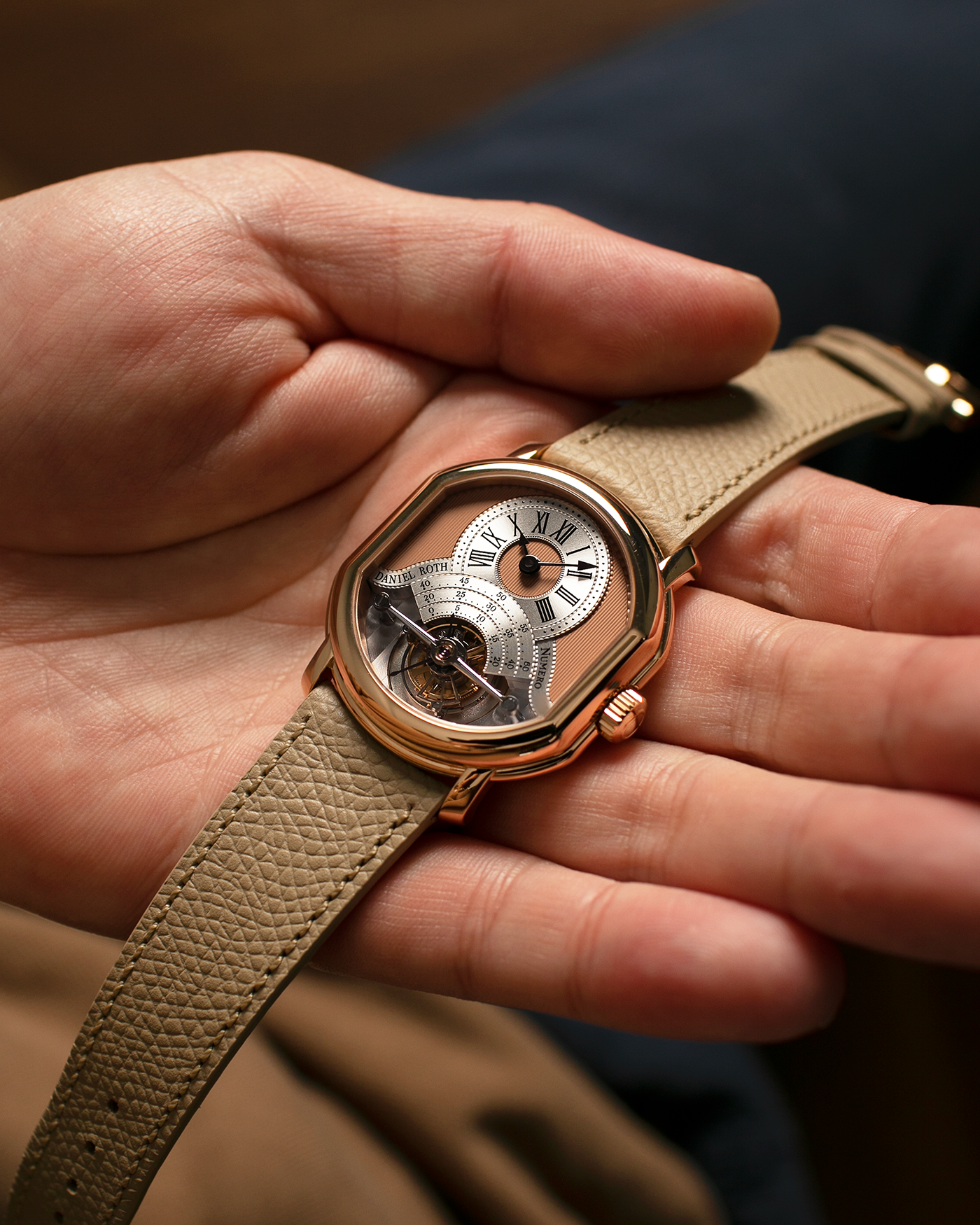 Brand: Daniel Roth
Year: 2025
Model: Tourbillon Rose Gold
Material: 18-carat Rose Gold, 925 Sterling Silver
Movement: Daniel Roth Cal. DR001, Manual-Winding
Case Dimensions: 35.5mm x 38.6mm x 9.2mm (Lug-to-Lug 42mm)
Lug Width: 20mm
Strap: Daniel Roth Taupe Calfskin Leather Strap with Signed 18-carat Rose Gold Tang Buckle