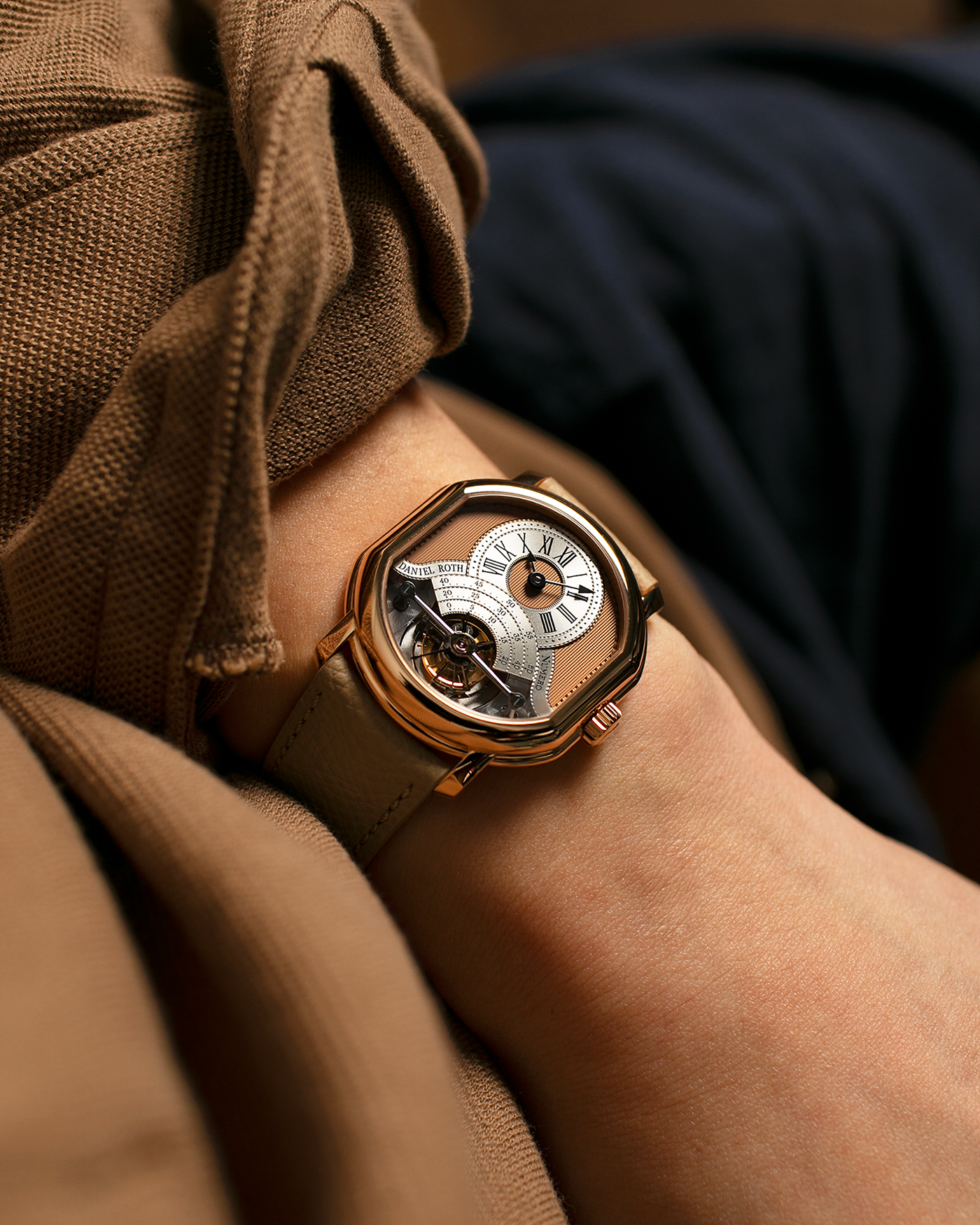 Brand: Daniel Roth
Year: 2025
Model: Tourbillon Rose Gold
Material: 18-carat Rose Gold, 925 Sterling Silver
Movement: Daniel Roth Cal. DR001, Manual-Winding
Case Dimensions: 35.5mm x 38.6mm x 9.2mm (Lug-to-Lug 42mm)
Lug Width: 20mm
Strap: Daniel Roth Taupe Calfskin Leather Strap with Signed 18-carat Rose Gold Tang Buckle