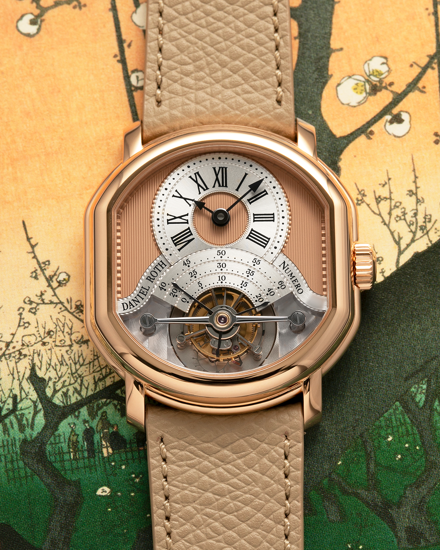 Brand: Daniel Roth
Year: 2025
Model: Tourbillon Rose Gold
Material: 18-carat Rose Gold, 925 Sterling Silver
Movement: Daniel Roth Cal. DR001, Manual-Winding
Case Dimensions: 35.5mm x 38.6mm x 9.2mm (Lug-to-Lug 42mm)
Lug Width: 20mm
Strap: Daniel Roth Taupe Calfskin Leather Strap with Signed 18-carat Rose Gold Tang Buckle