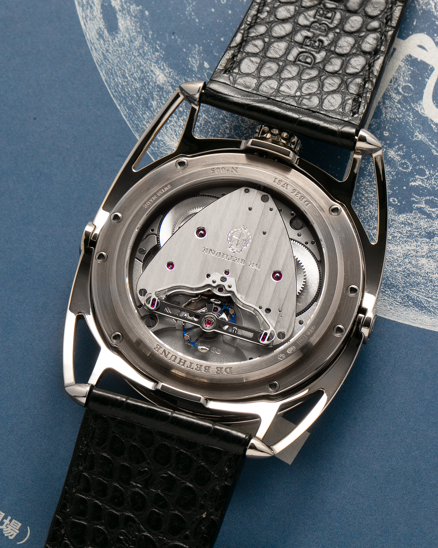 Brand: De Bethune
Year: 2008
Model: Perpetual Calendar Moonphase DB26RS1
Case Material: 18k White Gold, Titanium Lugs
Movement: Manual Winding DB205
Case Dimensions: 44.4mm Diameter 12.8mm Thickness
Strap: De Bethune Black Alligator Strap and De Bethune 18k White Gold Tang Buckle