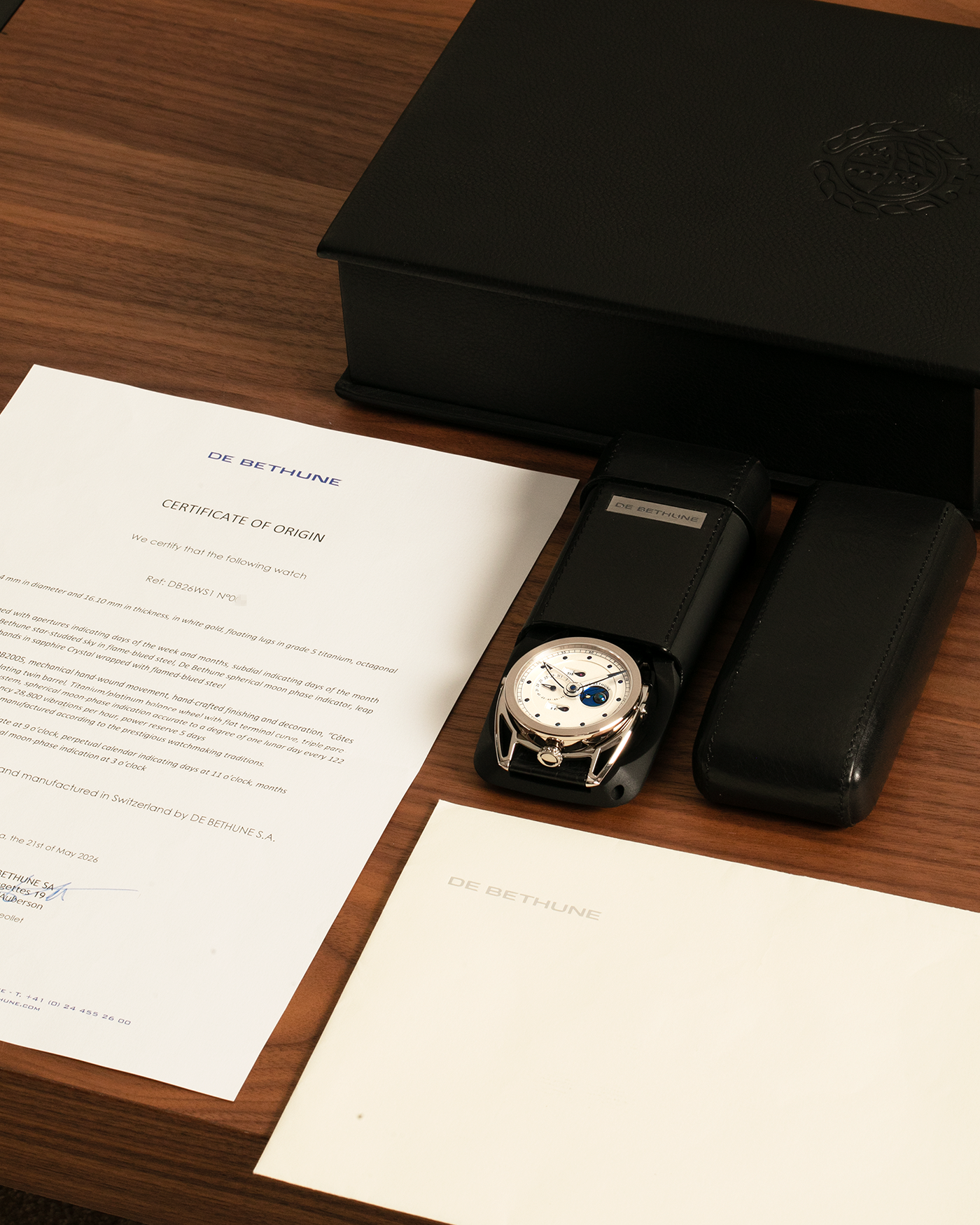 Brand: De Bethune
Year: 2008
Model: Perpetual Calendar Moonphase DB26RS1
Case Material: 18k White Gold, Titanium Lugs
Movement: Manual Winding DB205
Case Dimensions: 44.4mm Diameter 12.8mm Thickness
Strap: De Bethune Black Alligator Strap and De Bethune 18k White Gold Tang Buckle