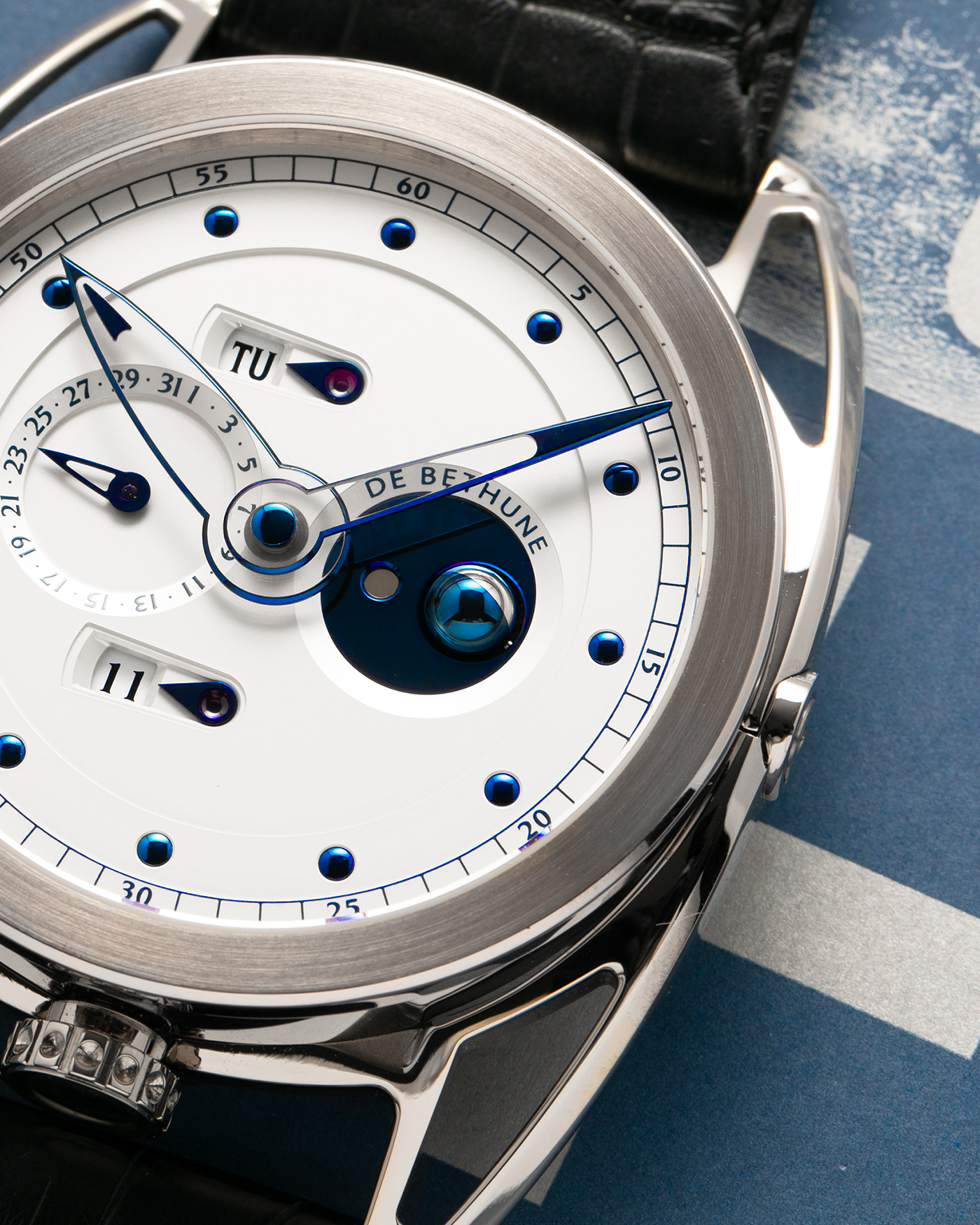 Brand: De Bethune
Year: 2008
Model: Perpetual Calendar Moonphase DB26RS1
Case Material: 18k White Gold, Titanium Lugs
Movement: Manual Winding DB205
Case Dimensions: 44.4mm Diameter 12.8mm Thickness
Strap: De Bethune Black Alligator Strap and De Bethune 18k White Gold Tang Buckle