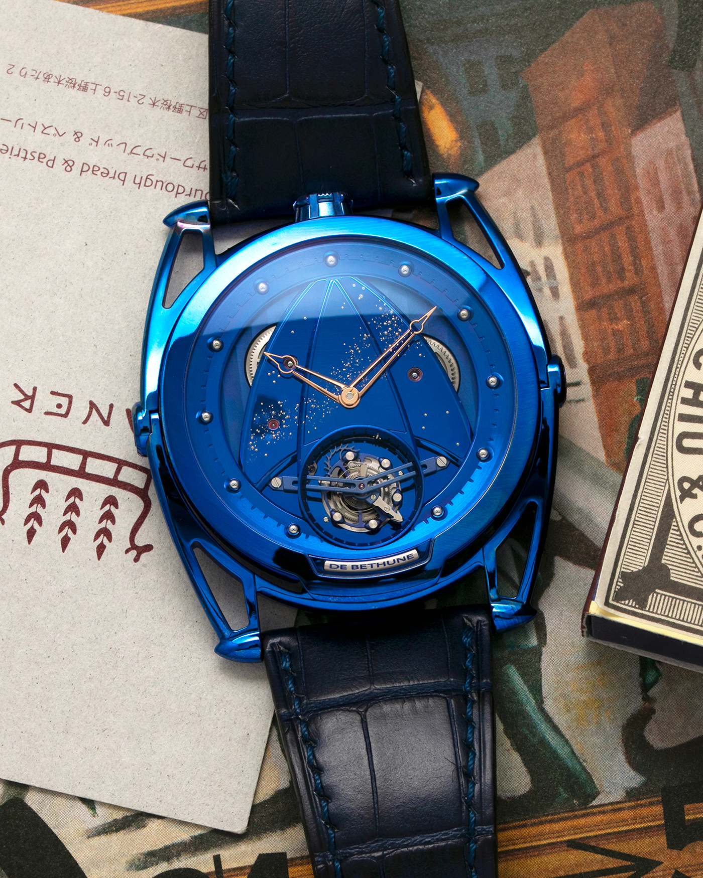 Brand: De Bethune Year: 2021 Model: Tourbillon Reference: DB28 ‘Kind of Blue’ Milky Way, Limited Edition of 5 Pieces Material: Blued Grade 5 Titanium Movement: Cal. DB2019, Manual-Winding Case Diameter: 43mm Strap: De Bethune Dark Blue Alligator Leather Strap with Signed Blued Titanium Tang Buckle, with additional De Bethune Dark Blue Tungsten Lizard Leather Strap