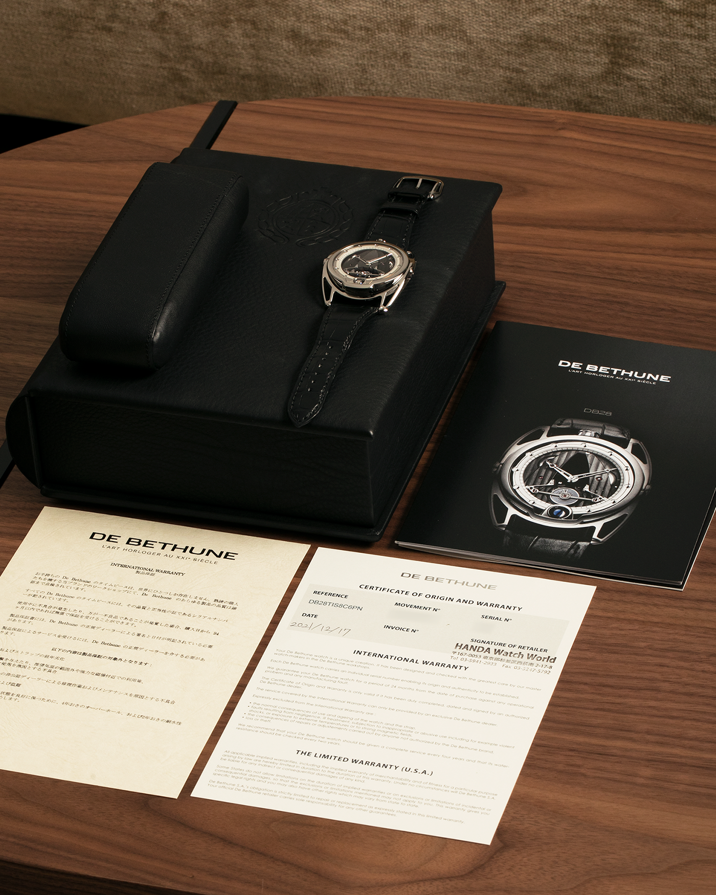 Brand: De Bethune
Year: 2021
Model: DB28TIS8C6PN
Reference: DB28 Titanium
Material: Grade 5 Titanium
Movement: De Bethune Cal. DB2115, Manual-Winding
Case Dimensions: 42.6mm x 9.3mm (Lug-to-Lug 58.3mm)
Lug Width: 26mm
Strap: De Bethune Black Alligator Leather Strap with Signed Titanium Tang Buckle 