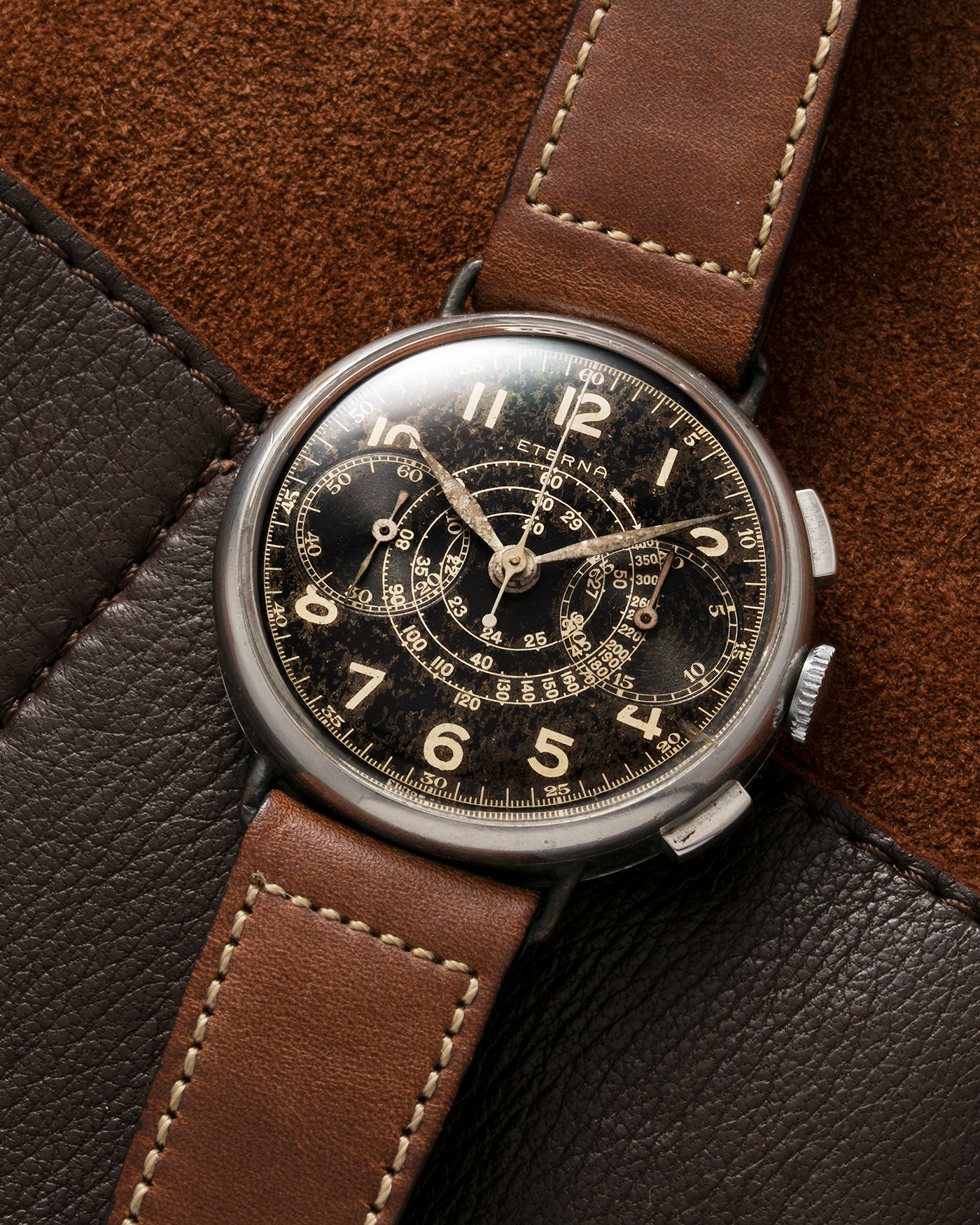 Brand: Eterna Year: 1940’s Serial Number: 2469370 Material: Stainless Steel (Staybrite) Movement: Cal. 703 (Based on Valjoux Cal. 22), Manual-Winding Case Diameter: 38mm Lug Width: 18mm Strap: Curious Curio Brown Open End Calf Leather Strap