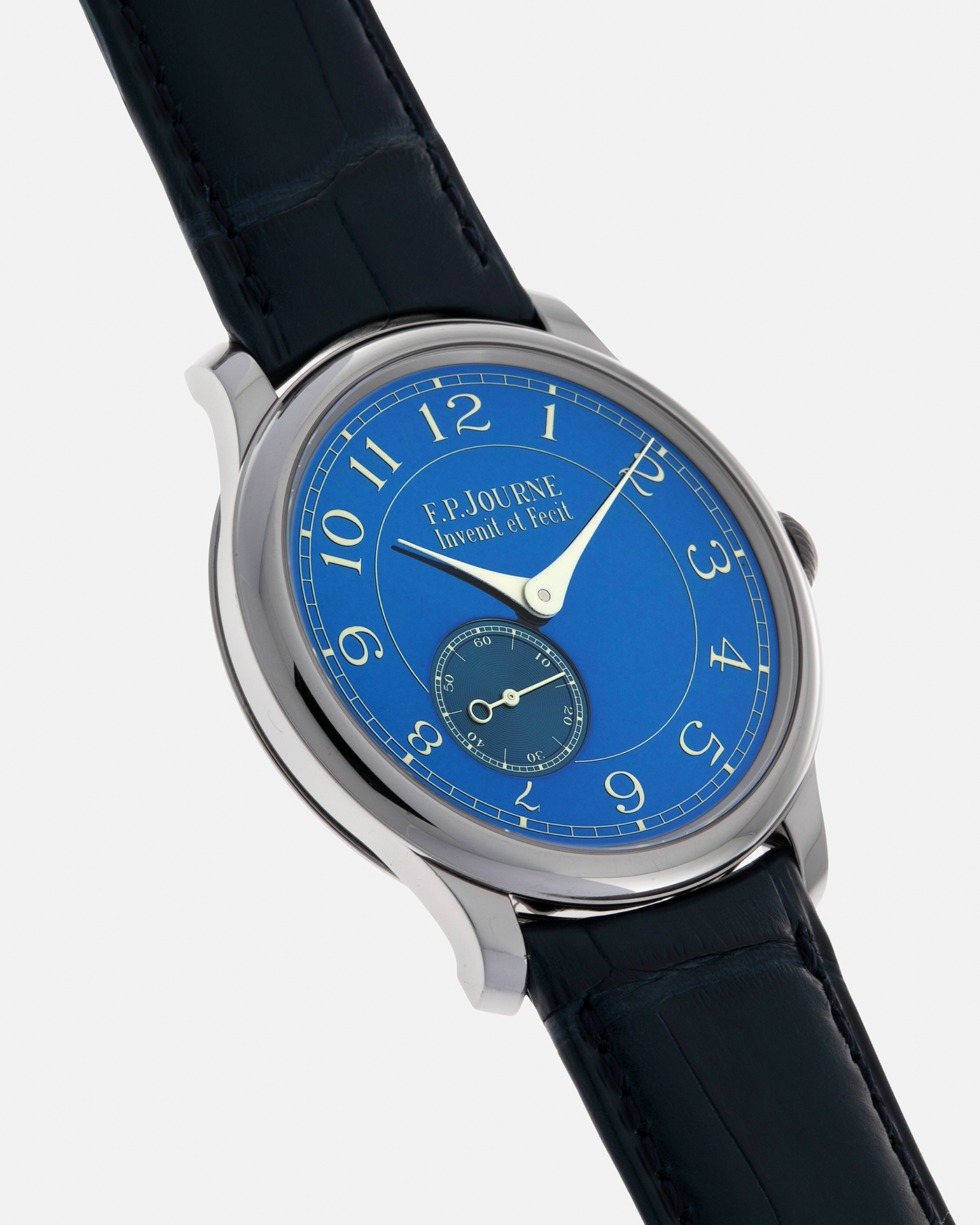 Brand: F.P. Journe
Year: 2012
Model: Chronomètre Bleu
Reference: 431-CB
Material: Tantalum Case, 18-carat Rose Gold Movement
Movement: F.P. Journe Cal. 1304, Manual-Winding
Case Dimensions: 39mm x 8.6mm (Lug-to-Lug 46mm)
Lug Width: 20mm
Straps: F.P. Journe Dark Navy Alligator Leather Strap with Signed Tantalum Tang Buckle, with extra F.P. Journe Tanned Alligator Leather Strap and a Generic Navy Blue Leather Strap with Contrasting Stitching