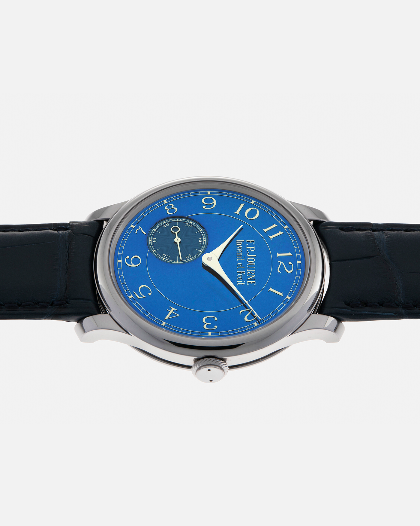 Brand: F.P. Journe
Year: 2012
Model: Chronomètre Bleu
Reference: 431-CB
Material: Tantalum Case, 18-carat Rose Gold Movement
Movement: F.P. Journe Cal. 1304, Manual-Winding
Case Dimensions: 39mm x 8.6mm (Lug-to-Lug 46mm)
Lug Width: 20mm
Straps: F.P. Journe Dark Navy Alligator Leather Strap with Signed Tantalum Tang Buckle, with extra F.P. Journe Tanned Alligator Leather Strap and a Generic Navy Blue Leather Strap with Contrasting Stitching
