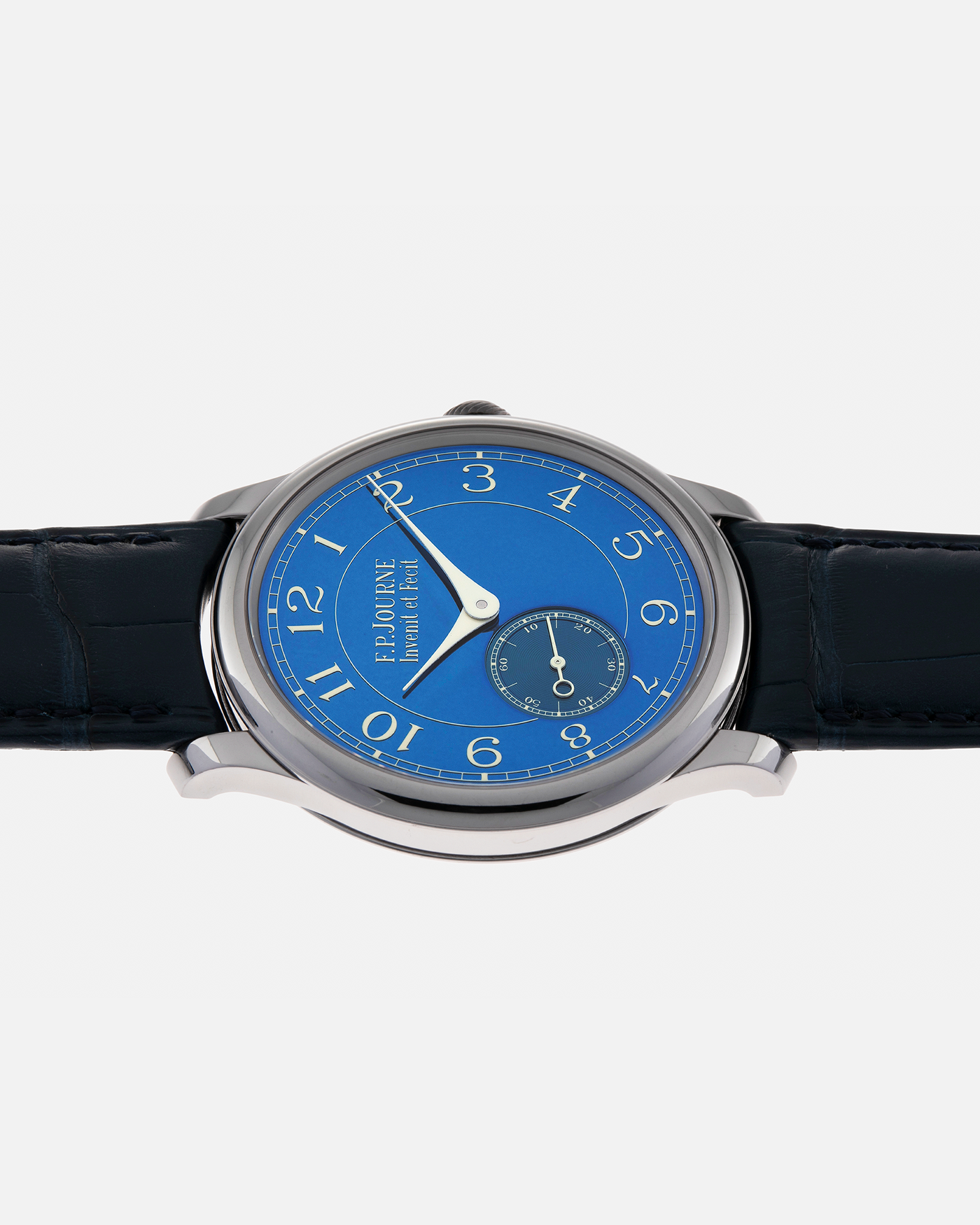 Brand: F.P. Journe
Year: 2012
Model: Chronomètre Bleu
Reference: 431-CB
Material: Tantalum Case, 18-carat Rose Gold Movement
Movement: F.P. Journe Cal. 1304, Manual-Winding
Case Dimensions: 39mm x 8.6mm (Lug-to-Lug 46mm)
Lug Width: 20mm
Straps: F.P. Journe Dark Navy Alligator Leather Strap with Signed Tantalum Tang Buckle, with extra F.P. Journe Tanned Alligator Leather Strap and a Generic Navy Blue Leather Strap with Contrasting Stitching