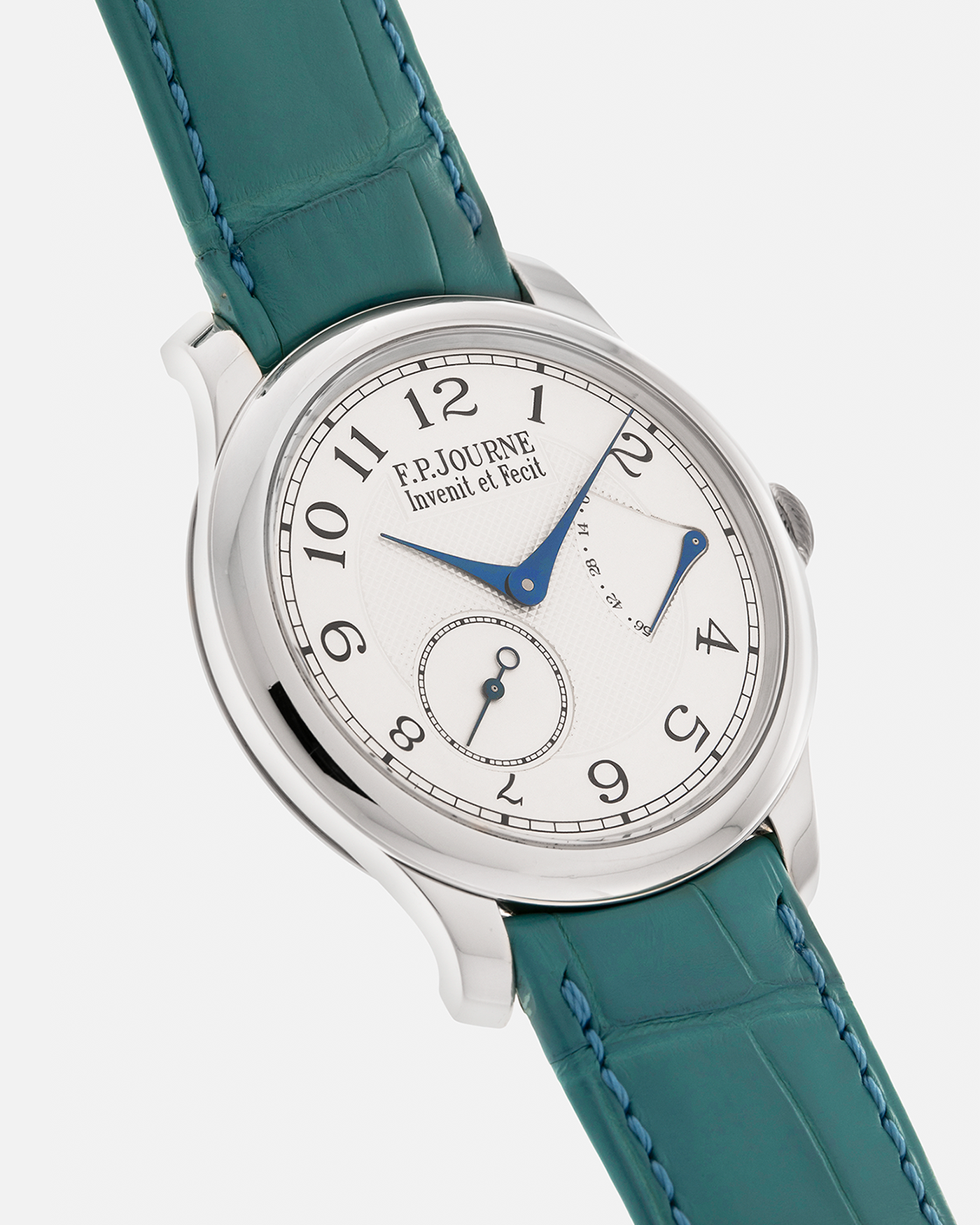 Brand: F.P. Journe
Year: 2010’s
Model: Chronomètre Souverain
Material: Platinum 950 Case, 18-Rose Gold Movement
Movement: F.P Journe Cal. 1304, Manual-Winding
Case Dimensions: 40mm x 8mm (Lug-to-Lug 48.2mm)
Lug Width: 20mm
Strap: F.P Journe Teal Alligator Leather Strap with Signed Platinum 950 Tang Buckle