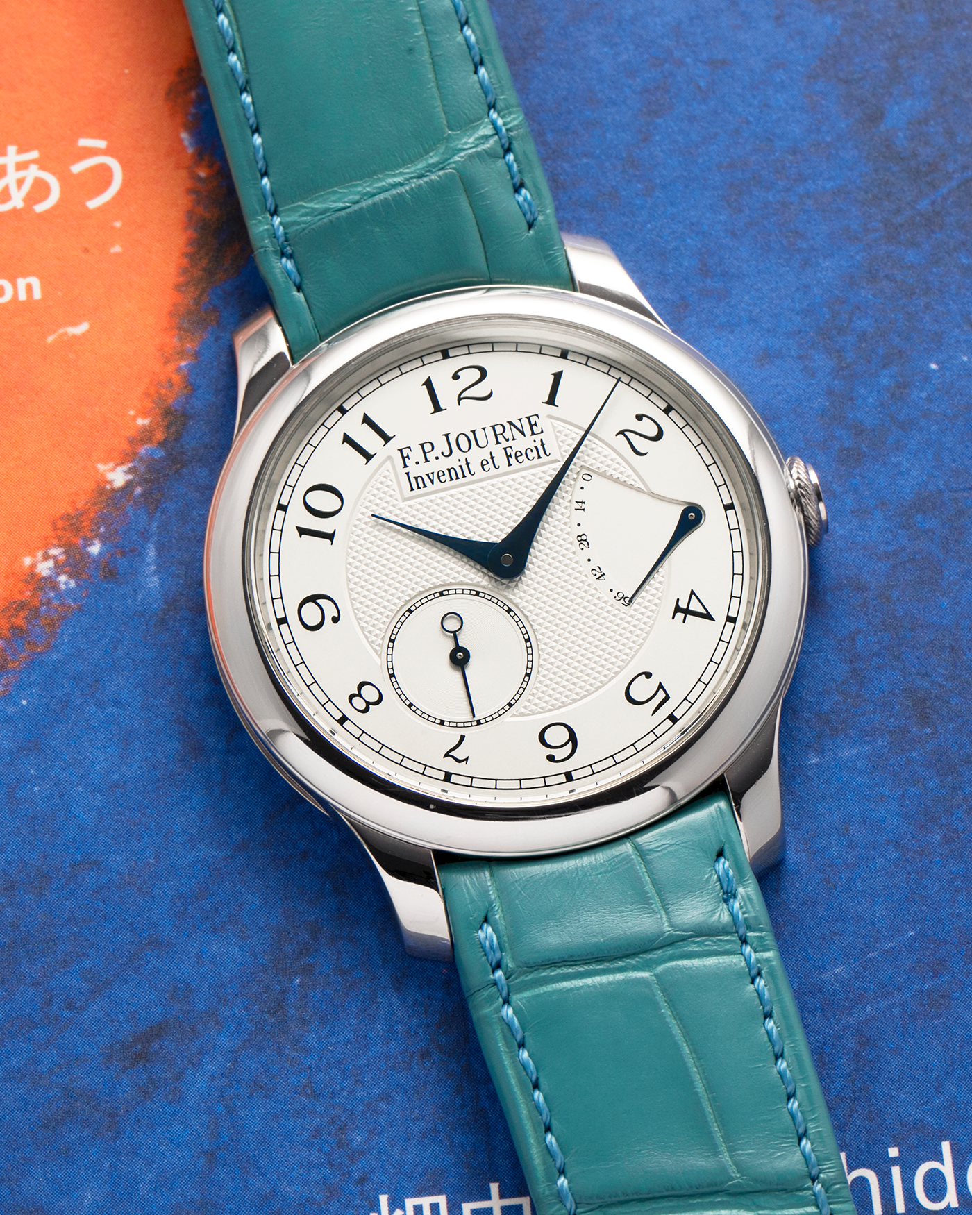 Brand: F.P. Journe
Year: 2010’s
Model: Chronomètre Souverain
Material: Platinum 950 Case, 18-Rose Gold Movement
Movement: F.P Journe Cal. 1304, Manual-Winding
Case Dimensions: 40mm x 8mm (Lug-to-Lug 48.2mm)
Lug Width: 20mm
Strap: F.P Journe Teal Alligator Leather Strap with Signed Platinum 950 Tang Buckle