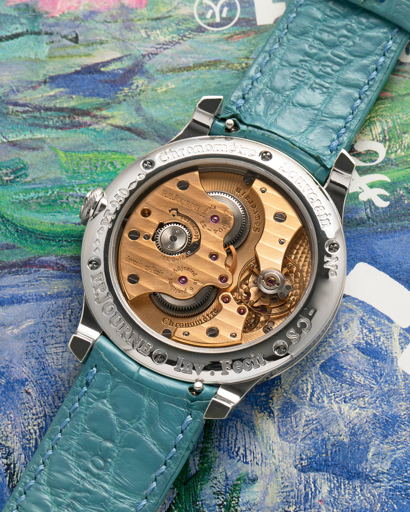Brand: F.P. Journe
Year: 2010’s
Model: Chronomètre Souverain
Material: Platinum 950 Case, 18-Rose Gold Movement
Movement: F.P Journe Cal. 1304, Manual-Winding
Case Dimensions: 40mm x 8mm (Lug-to-Lug 48.2mm)
Lug Width: 20mm
Strap: F.P Journe Teal Alligator Leather Strap with Signed Platinum 950 Tang Buckle