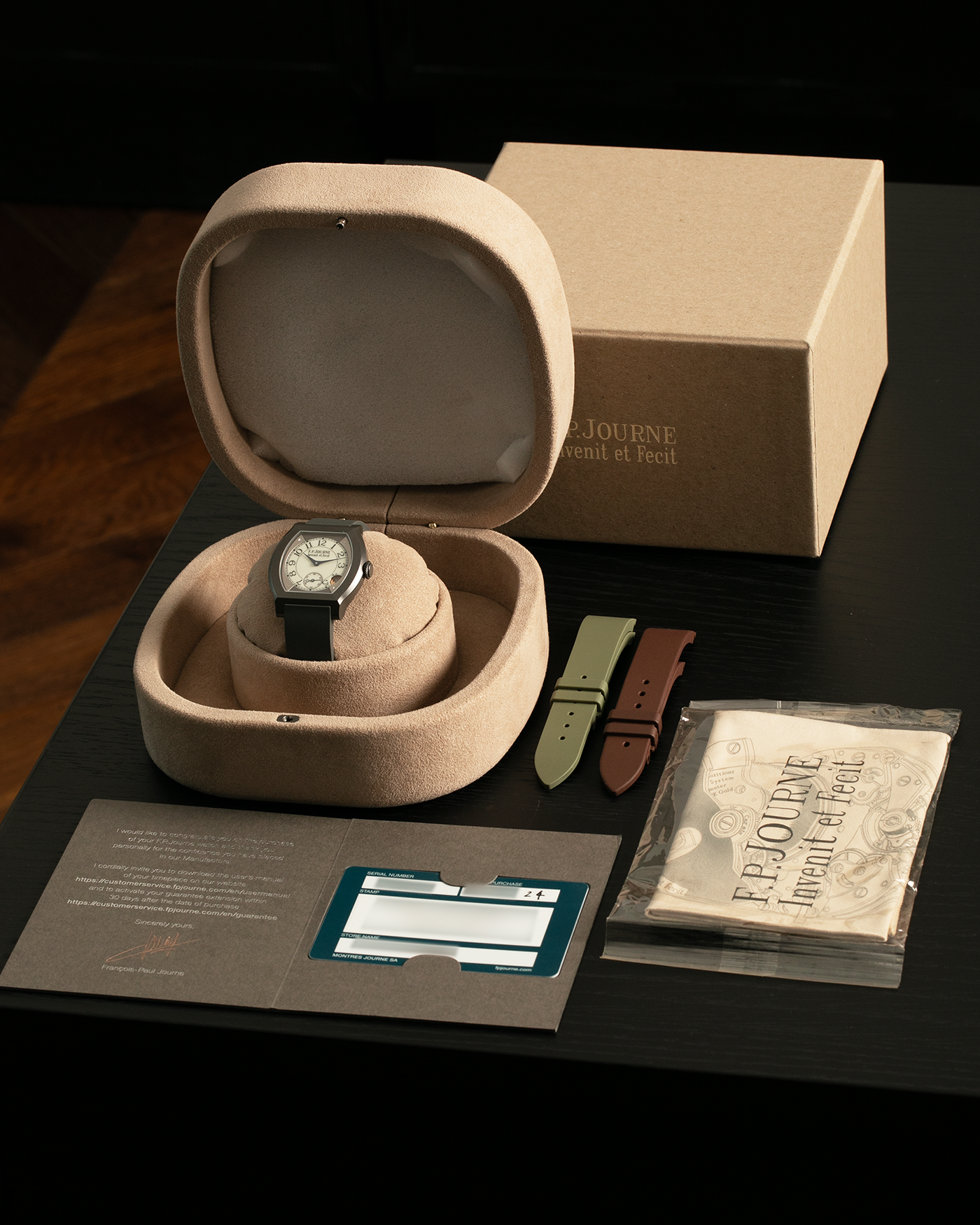Brand: F.P. Journe
Year: 2024
Model: Elegante 40
Material: Titalyt-Treated Grade 5 Titanium
Movement: F.P. Journe Cal. 1210, Electromechanical Quartz
Case Dimensions: 40mm x 35mm x 7.35mm (Lug-to-Lug 40mm)
Lug Width: 17mm
Straps: F.P. Journe Brown Rubber Strap with Signed Titalyt-treated Grade 5 Titanium Tang Buckle, extra F.P. Journe Dark Grey Rubber Strap, extra F.P. Journe Green Rubber Strap