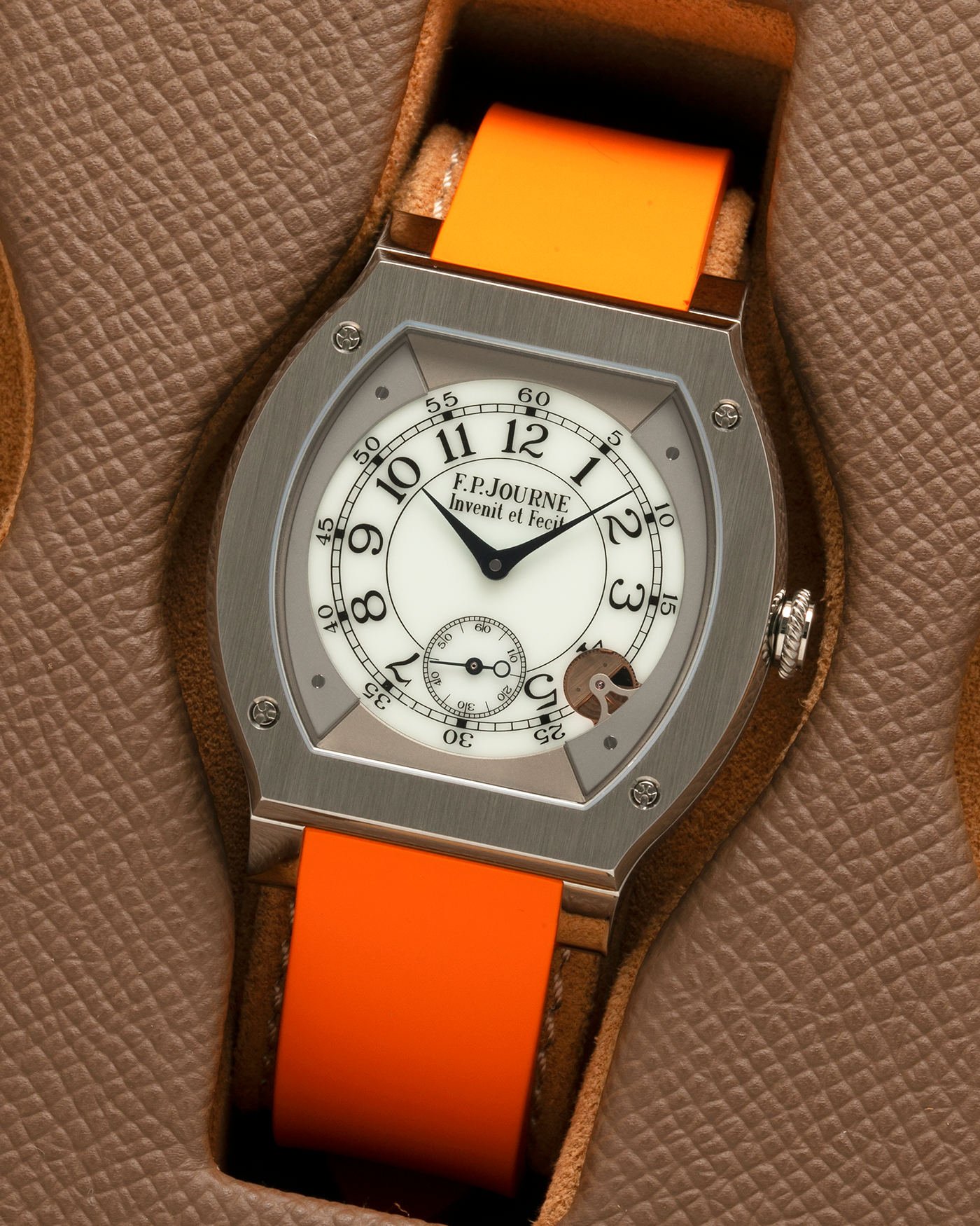 Brand: F.P. Journe
Year: 2021
Model: Elegante 48
Reference: ELHT
Material: Titanium
Movement: F.P. Journe Cal. 1210, Electromechanical Quartz
Case Dimensions: 48mm (Including Lugs) x 40mm x 7.95mm
Lug Width: 18mm
Strap: F.P. Journe Orange Sillicon Rubber Strap with Signed Titanium Tang Buckle