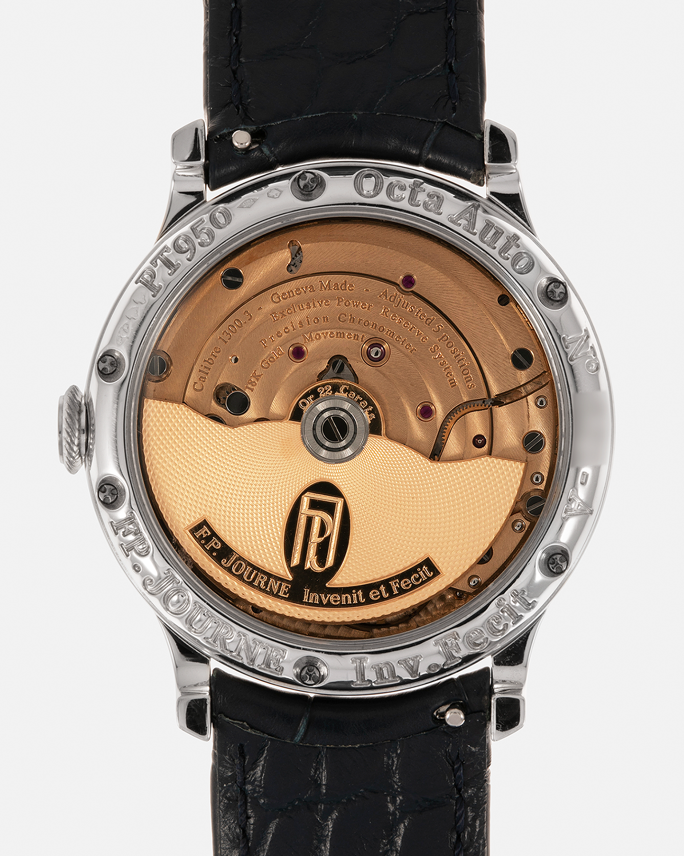 Brand: F.P. Journe
Year: 2008
Model: Octa Réserve de Marche
Material: Platinum 950 Case, Red Gold Movement
Movement: F.P. Journe Cal. 1300.3, Self-Winding
Case Dimensions: 38mm x 10mm (46.6mm Lug-to-Lug)
Lug Width: 20mm
Strap: F.P. Journe Navy Blue Alligator Leather Strap and Signed Platinum 950 Tang Buckle