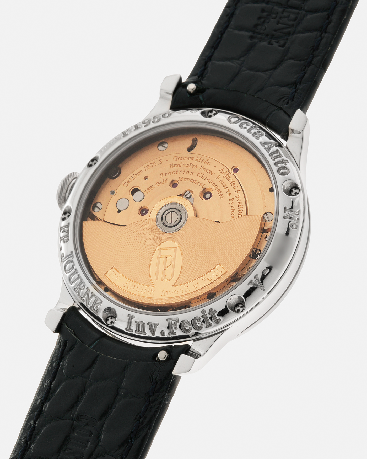 Brand: F.P. Journe
Year: 2008
Model: Octa Réserve de Marche
Material: Platinum 950 Case, Red Gold Movement
Movement: F.P. Journe Cal. 1300.3, Self-Winding
Case Dimensions: 38mm x 10mm (46.6mm Lug-to-Lug)
Lug Width: 20mm
Strap: F.P. Journe Navy Blue Alligator Leather Strap and Signed Platinum 950 Tang Buckle