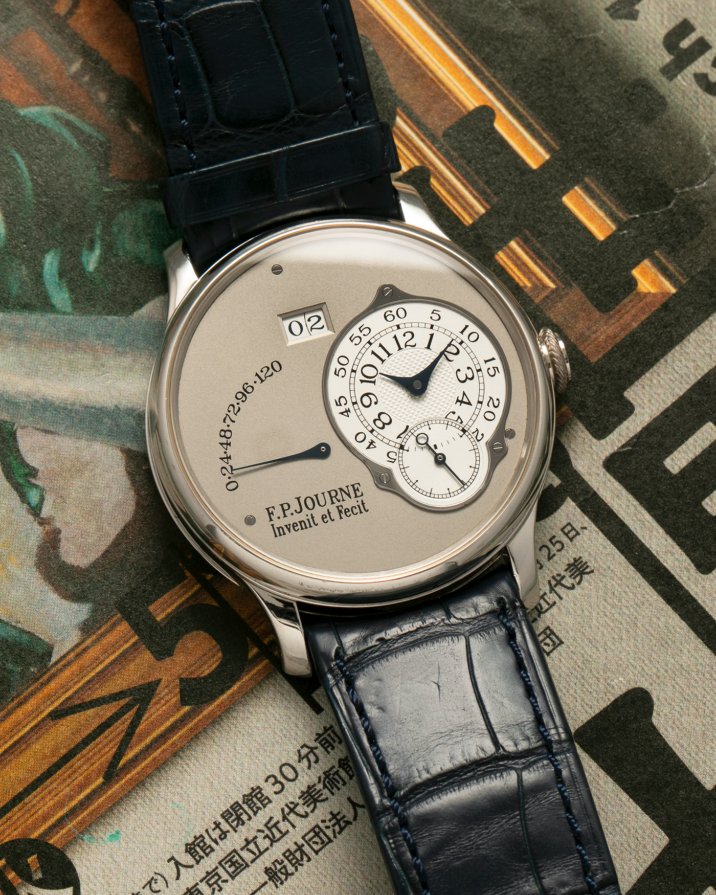 Brand: F.P. Journe
Year: 2008
Model: Octa Réserve de Marche
Material: Platinum 950 Case, Red Gold Movement
Movement: F.P. Journe Cal. 1300.3, Self-Winding
Case Dimensions: 38mm x 10mm (46.6mm Lug-to-Lug)
Lug Width: 20mm
Strap: F.P. Journe Navy Blue Alligator Leather Strap and Signed Platinum 950 Tang Buckle