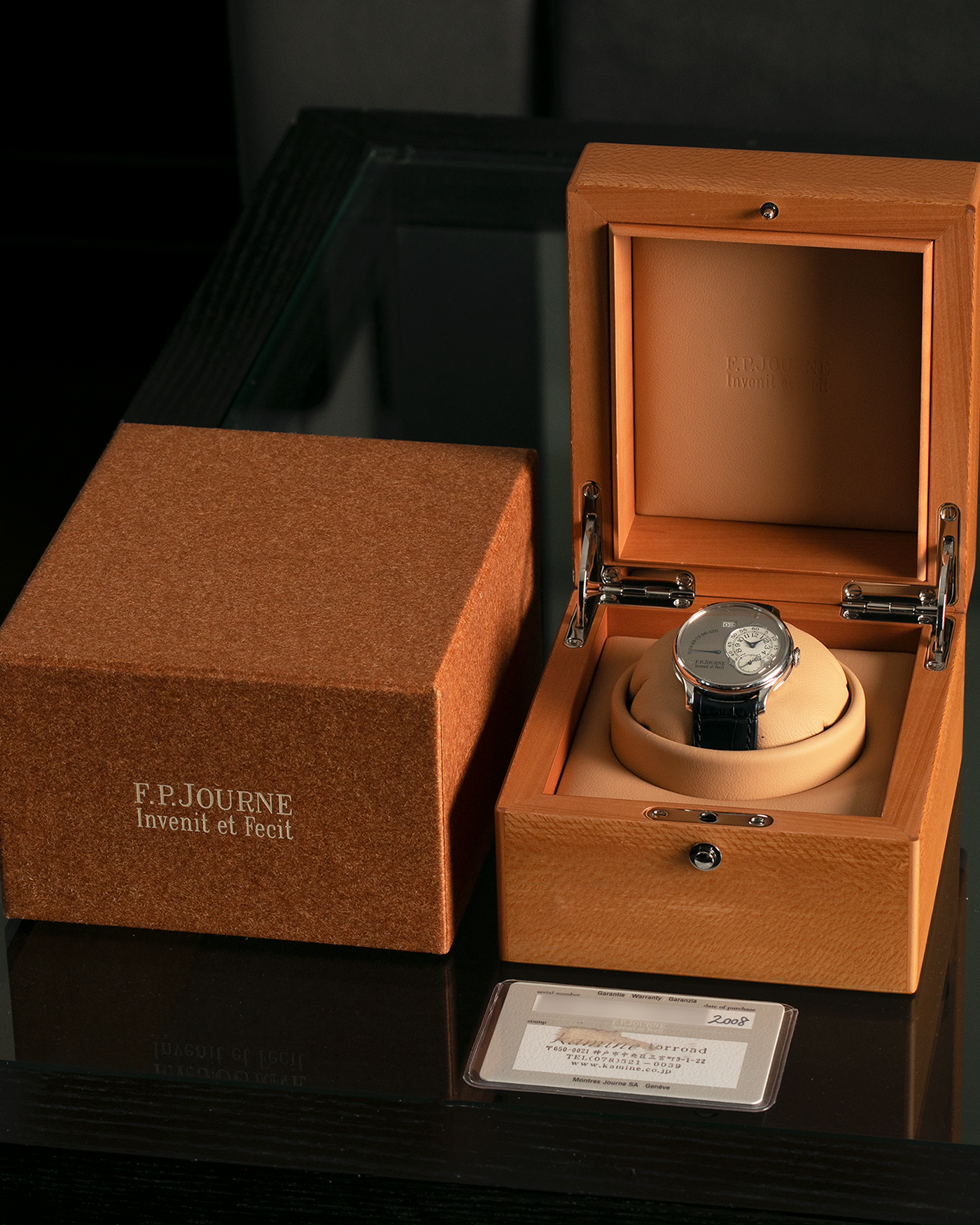Brand: F.P. Journe
Year: 2008
Model: Octa Réserve de Marche
Material: Platinum 950 Case, Red Gold Movement
Movement: F.P. Journe Cal. 1300.3, Self-Winding
Case Dimensions: 38mm x 10mm (46.6mm Lug-to-Lug)
Lug Width: 20mm
Strap: F.P. Journe Navy Blue Alligator Leather Strap and Signed Platinum 950 Tang Buckle