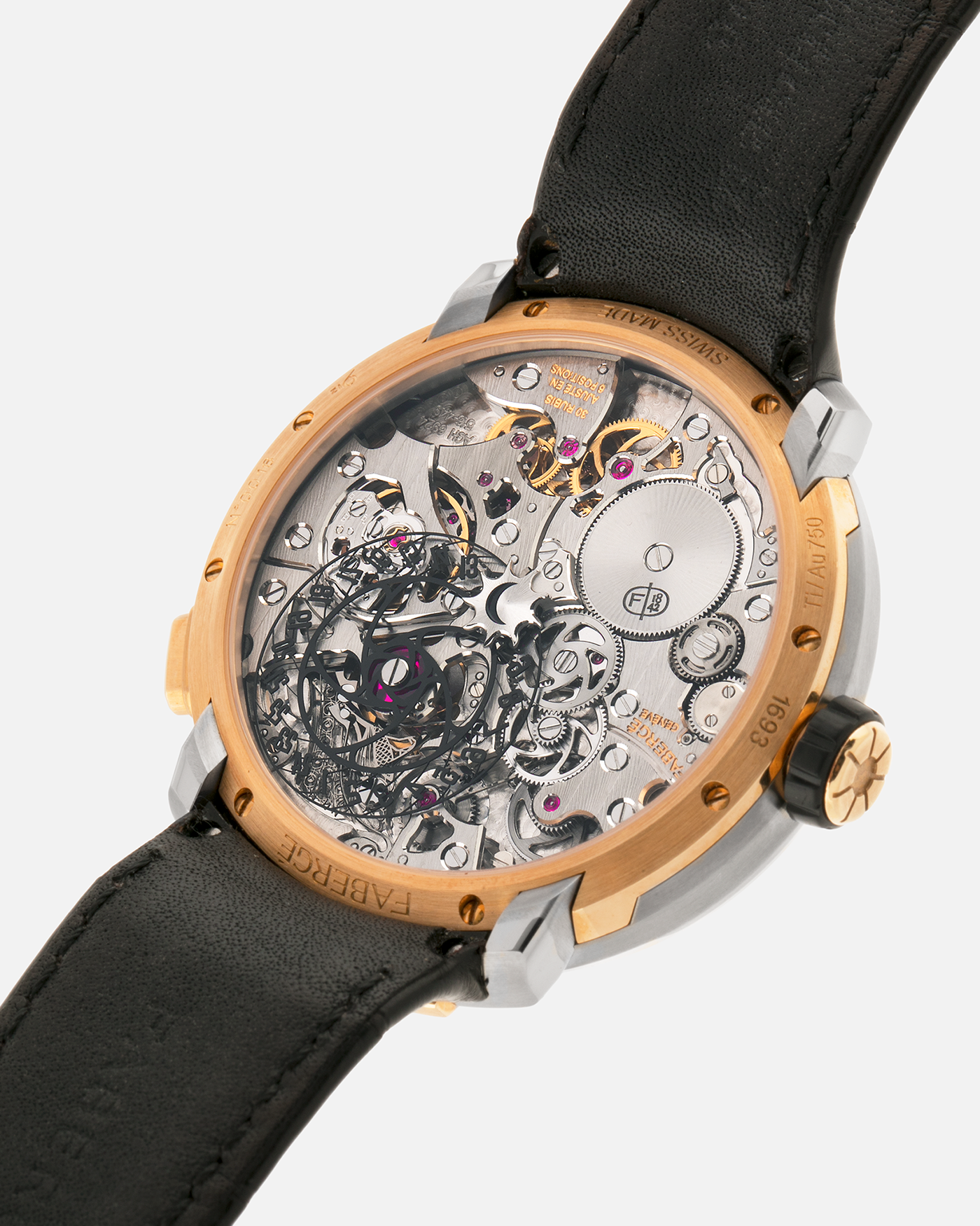 Brand: Fabergé
Year: 2016 (Approximation)
Model: Visionnaire DTZ Dual Time Zone
Material: 18k Rose Gold and Titanium
Movement: Self-Winding Agenhor AGH 6924 (Peripheral Rotor)
Case Dimensions: 43m Diameter 14.2mm Thickness
Strap: Fabergé Black Alligator Strap With Signed 18k Rose Gold Deployant Clasp