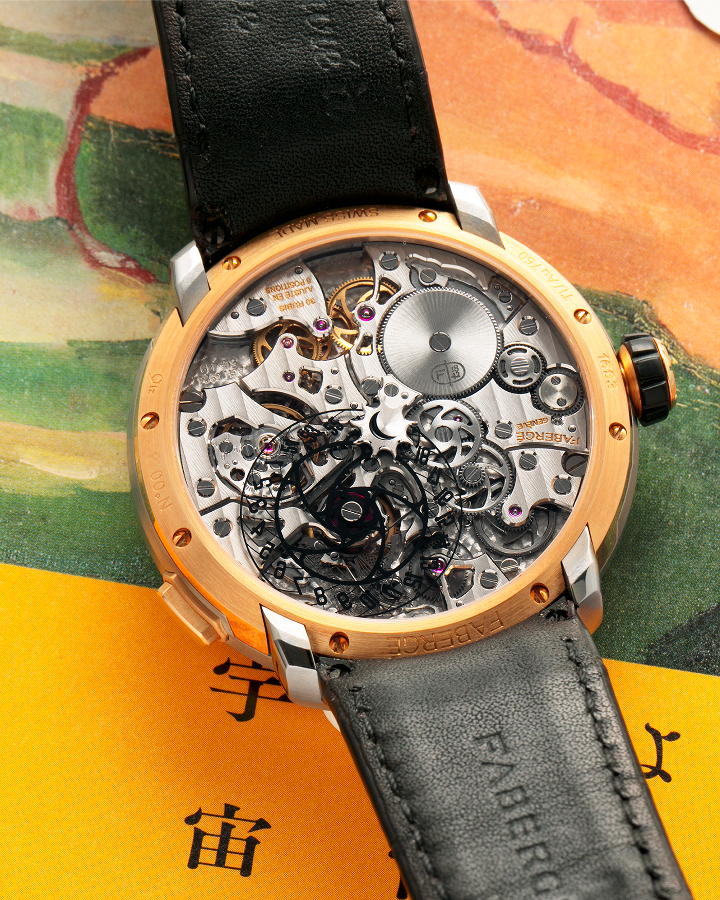 Brand: Fabergé
Year: 2016 (Approximation)
Model: Visionnaire DTZ Dual Time Zone
Material: 18k Rose Gold and Titanium
Movement: Self-Winding Agenhor AGH 6924 (Peripheral Rotor)
Case Dimensions: 43m Diameter 14.2mm Thickness
Strap: Fabergé Black Alligator Strap With Signed 18k Rose Gold Deployant Clasp