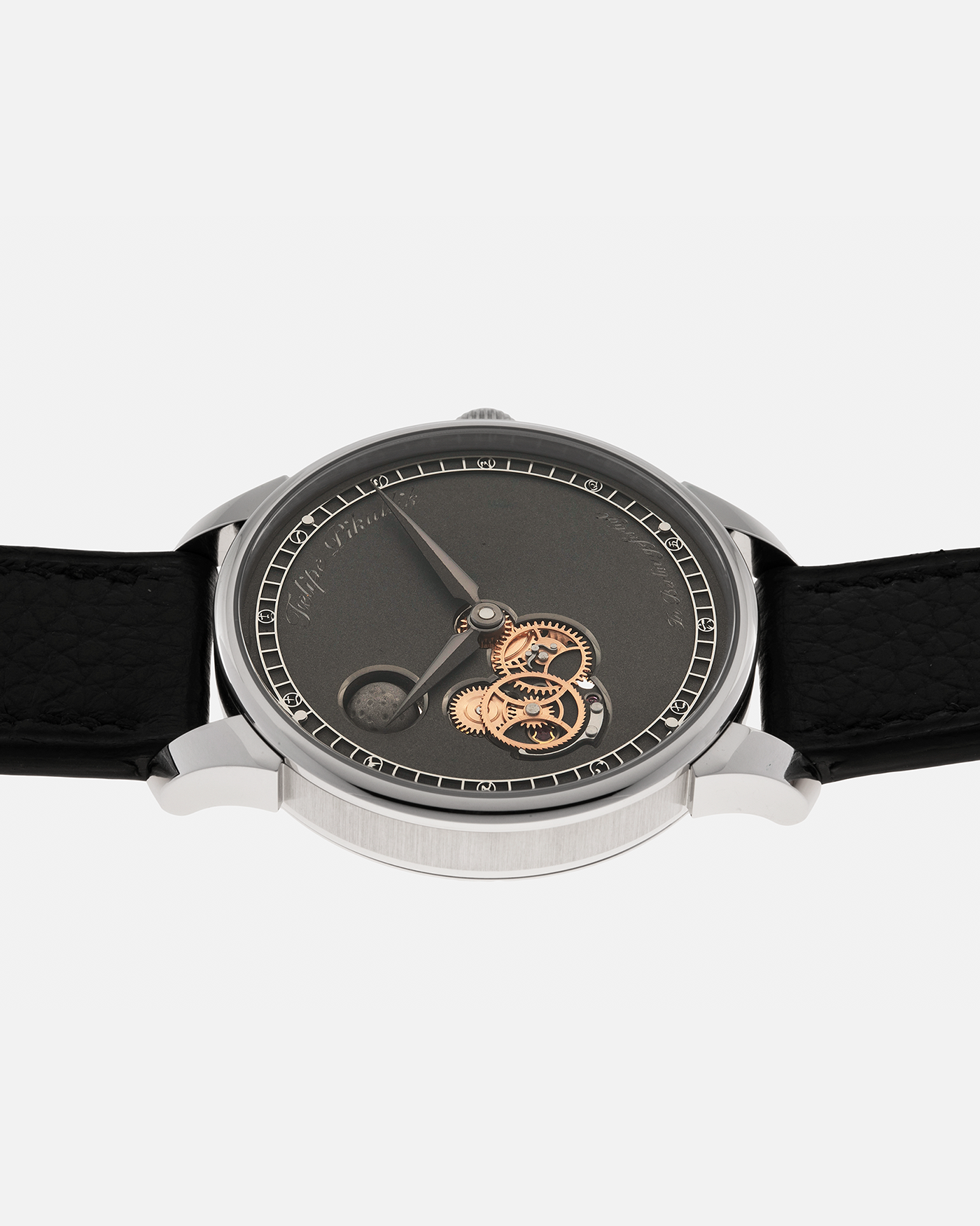 Brand: Felipe Pikullik
Year: 2024
Model: Mondphase 1, Limited Edition of 20 pieces
Material: Stainless Steel
Movement: Heavily-Modified and Hand-Decorated Unitas Cal. 6497, Manual-Winding
Case Dimensions: 41mm x 10.5mm (50mm Lug-to-Lug)
Lug Width: 20mm
Strap: Felipe Pikullik Black Alligator Leather Strap with Signed Stainless Steel Tang Buckle