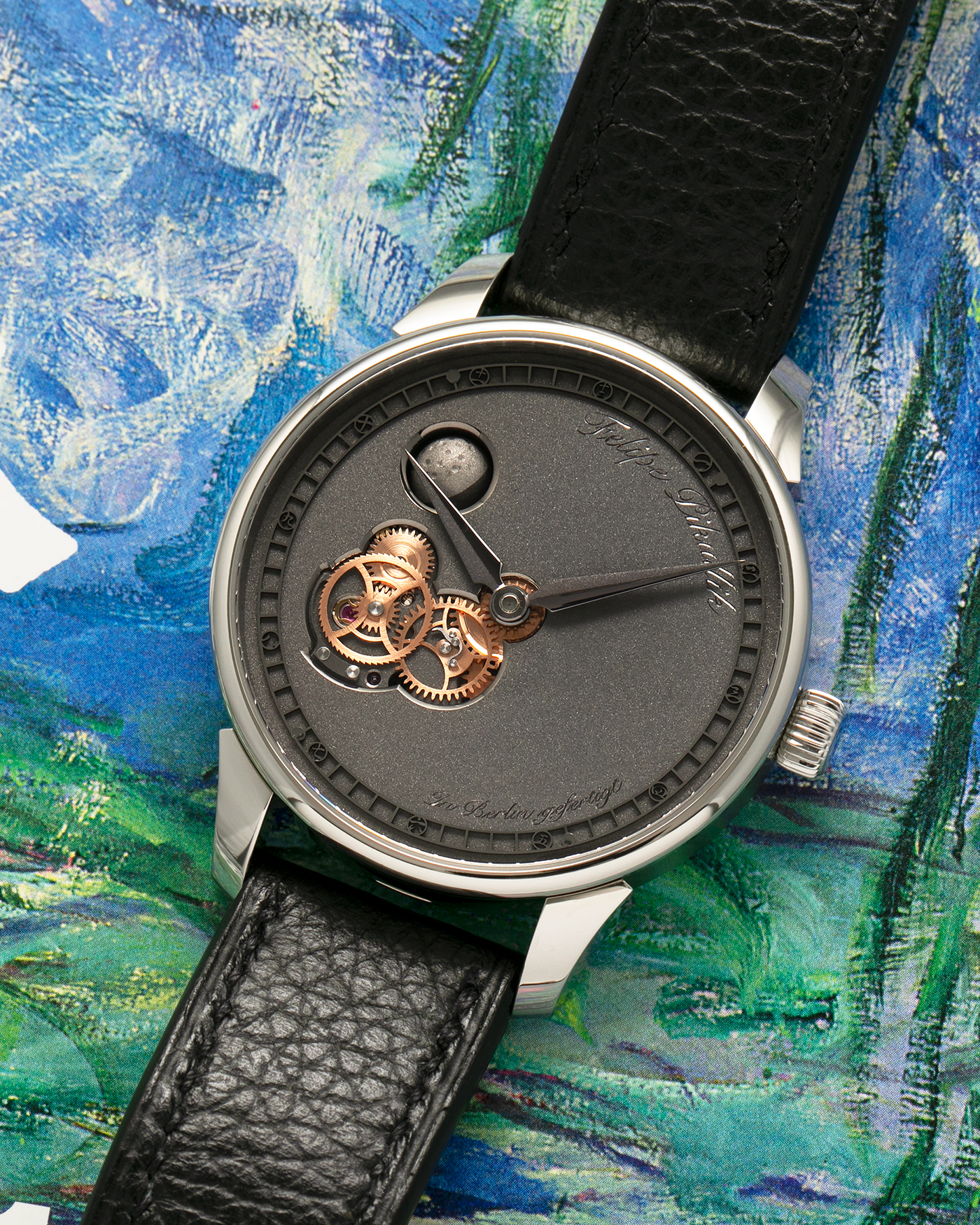 Brand: Felipe Pikullik
Year: 2024
Model: Mondphase 1, Limited Edition of 20 pieces
Material: Stainless Steel
Movement: Heavily-Modified and Hand-Decorated Unitas Cal. 6497, Manual-Winding
Case Dimensions: 41mm x 10.5mm (50mm Lug-to-Lug)
Lug Width: 20mm
Strap: Felipe Pikullik Black Alligator Leather Strap with Signed Stainless Steel Tang Buckle