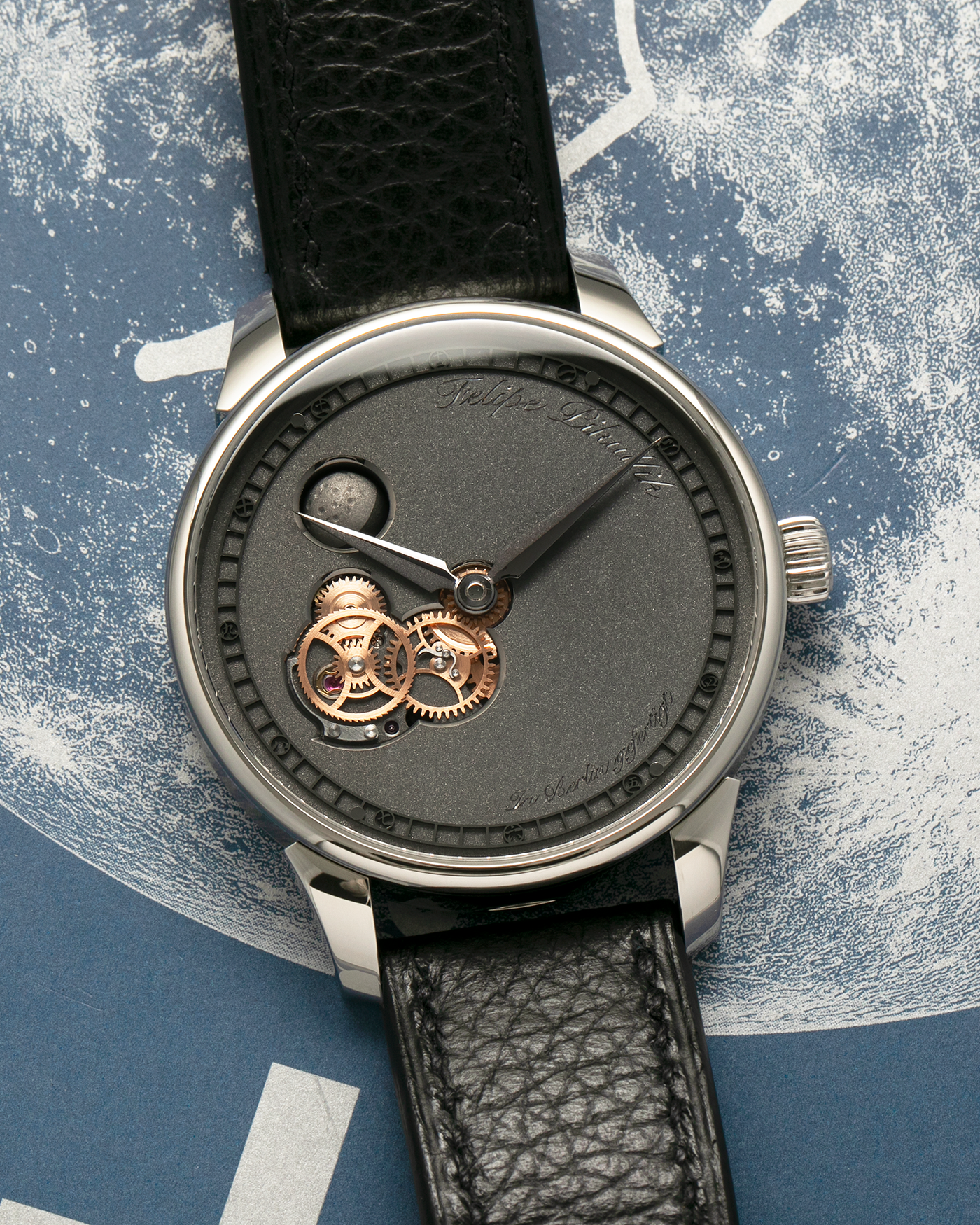 Brand: Felipe Pikullik
Year: 2024
Model: Mondphase 1, Limited Edition of 20 pieces
Material: Stainless Steel
Movement: Heavily-Modified and Hand-Decorated Unitas Cal. 6497, Manual-Winding
Case Dimensions: 41mm x 10.5mm (50mm Lug-to-Lug)
Lug Width: 20mm
Strap: Felipe Pikullik Black Alligator Leather Strap with Signed Stainless Steel Tang Buckle