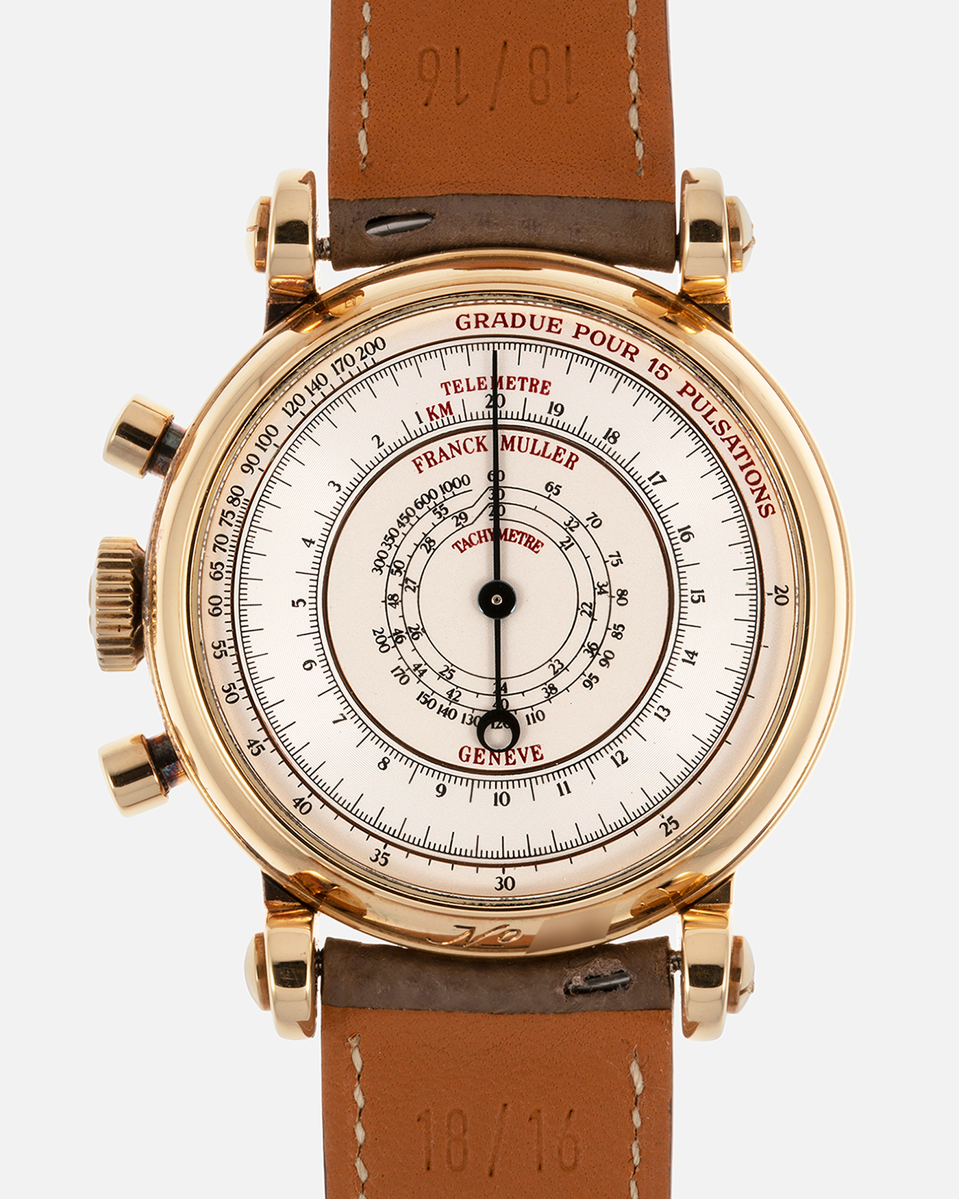 Brand: Franck Muller Year: 2000’s Model: Chronographe Double Face Reference: 2870 NA DF Material: 18-carat Yellow Gold Movement: Lemania Cal. 1872, Manual-Winding Case Diameter: 37mm Strap: Nostime Sand Tan Suede Calf Leather Strap with Signed 18-carat Tang Buckle, Additional Franck Muller Black Alligator Leather Strap.