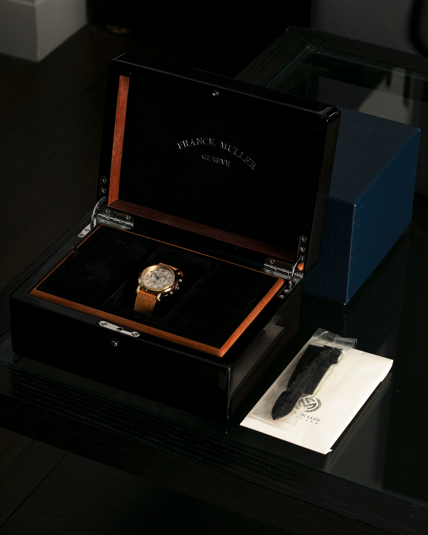 Brand: Franck Muller Year: 2000’s Model: Chronographe Double Face Reference: 2870 NA DF Material: 18-carat Yellow Gold Movement: Lemania Cal. 1872, Manual-Winding Case Diameter: 37mm Strap: Nostime Sand Tan Suede Calf Leather Strap with Signed 18-carat Tang Buckle, Additional Franck Muller Black Alligator Leather Strap.