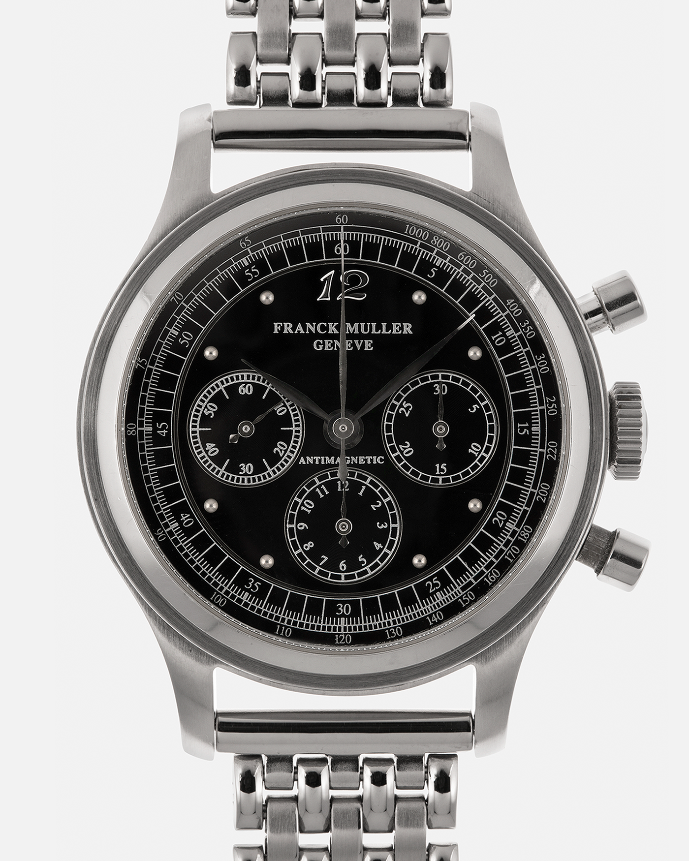 Brand: Franck Muller
Year: 1990’s
Model: Sport Limited Edition Chronograph
Material: Stainless Steel
Movement: Modified Lemania Cal. 1874, Manual-Winding
Case Dimensions: 37mm x 12.5mm (Lug-to-Lug 46.3mm)
Lug Width: 18mm
Bracelet: Private Eyes Beads of Rice Bracelet in Stainless Steel