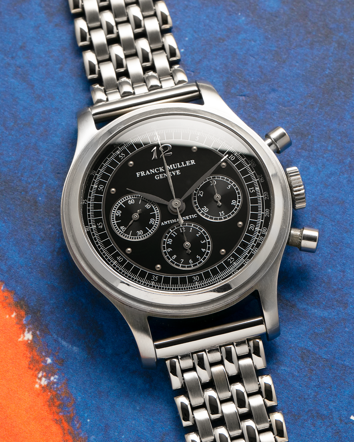 Brand: Franck Muller
Year: 1990’s
Model: Sport Limited Edition Chronograph
Material: Stainless Steel
Movement: Modified Lemania Cal. 1874, Manual-Winding
Case Dimensions: 37mm x 12.5mm (Lug-to-Lug 46.3mm)
Lug Width: 18mm
Bracelet: Private Eyes Beads of Rice Bracelet in Stainless Steel