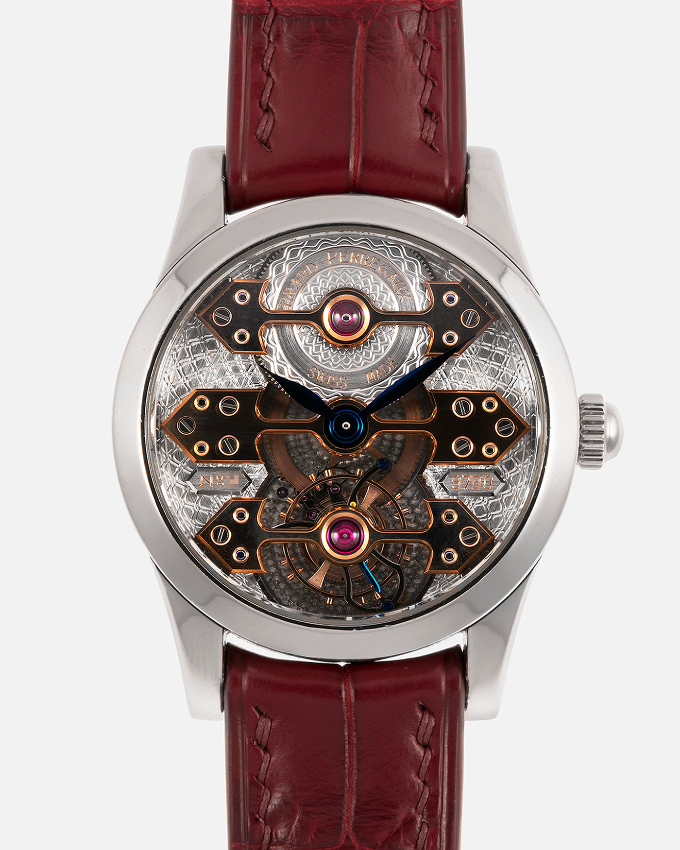 Brand: Girard Perregaux
Year: Late 90’s / Early 2000’s
Model: Three Bridges Tourbillon, “Tourbillon Sous Trois Ponts d'Or”
Reference: 9700
Material: 18k White Gold
Movement: Manual-Winding Girard Perregaux Cal. T3P
Case Dimensions: 31mm Diameter 9mm Thickness
Lug Width: 20mm
Strap: Custom Order Burgundy Alligator Strap, Girard Perregaux Iridescent Blue Alligator Strap and 18k White Gold Girard Perregaux Deployant Clasp