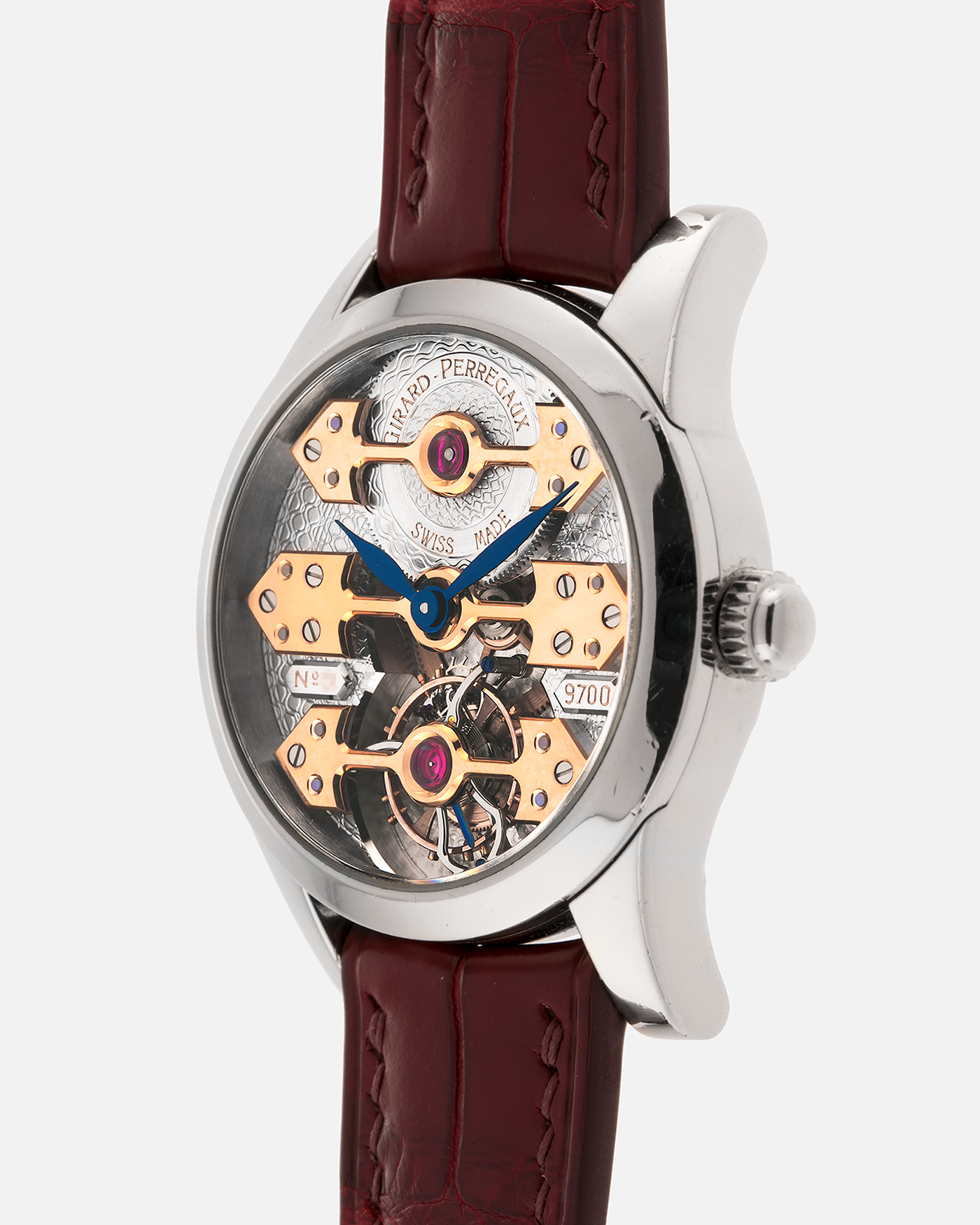 Brand: Girard Perregaux
Year: Late 90’s / Early 2000’s
Model: Three Bridges Tourbillon, “Tourbillon Sous Trois Ponts d'Or”
Reference: 9700
Material: 18k White Gold
Movement: Manual-Winding Girard Perregaux Cal. T3P
Case Dimensions: 31mm Diameter 9mm Thickness
Lug Width: 20mm
Strap: Custom Order Burgundy Alligator Strap, Girard Perregaux Iridescent Blue Alligator Strap and 18k White Gold Girard Perregaux Deployant Clasp