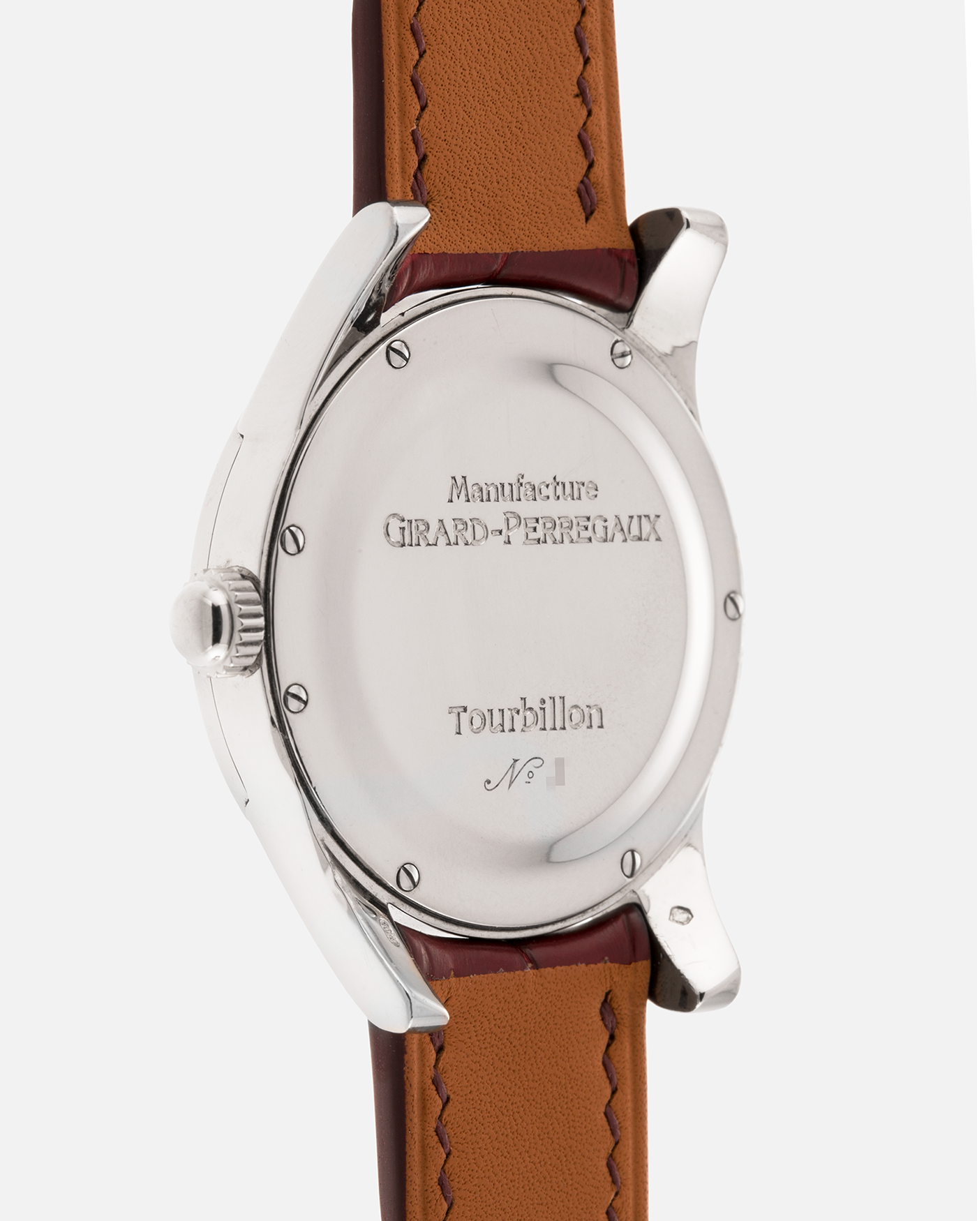 Brand: Girard Perregaux
Year: Late 90’s / Early 2000’s
Model: Three Bridges Tourbillon, “Tourbillon Sous Trois Ponts d'Or”
Reference: 9700
Material: 18k White Gold
Movement: Manual-Winding Girard Perregaux Cal. T3P
Case Dimensions: 31mm Diameter 9mm Thickness
Lug Width: 20mm
Strap: Custom Order Burgundy Alligator Strap, Girard Perregaux Iridescent Blue Alligator Strap and 18k White Gold Girard Perregaux Deployant Clasp